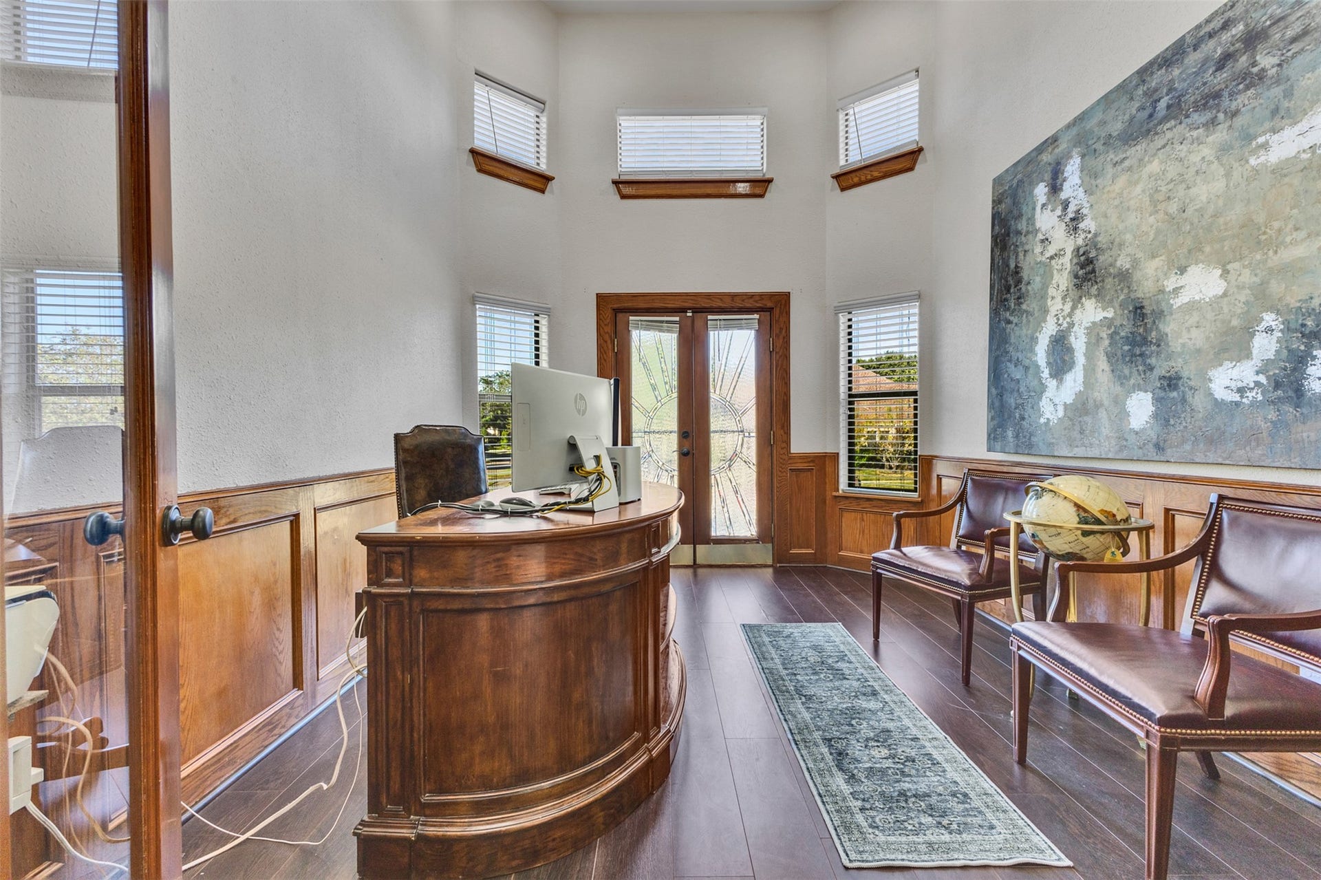 8606 Argentina Street, Houston, TX 77040 A stunning home office featuring an impressive balcony and abundant natural light, creating an inspiring space for work or study.