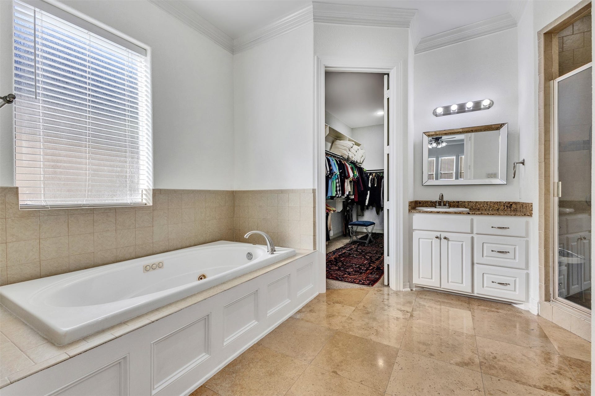 8606 Argentina Street, Houston, TX 77040 Primary Bathroom: The primary bathroom complements the suite with a dedicated space for your daily routine.