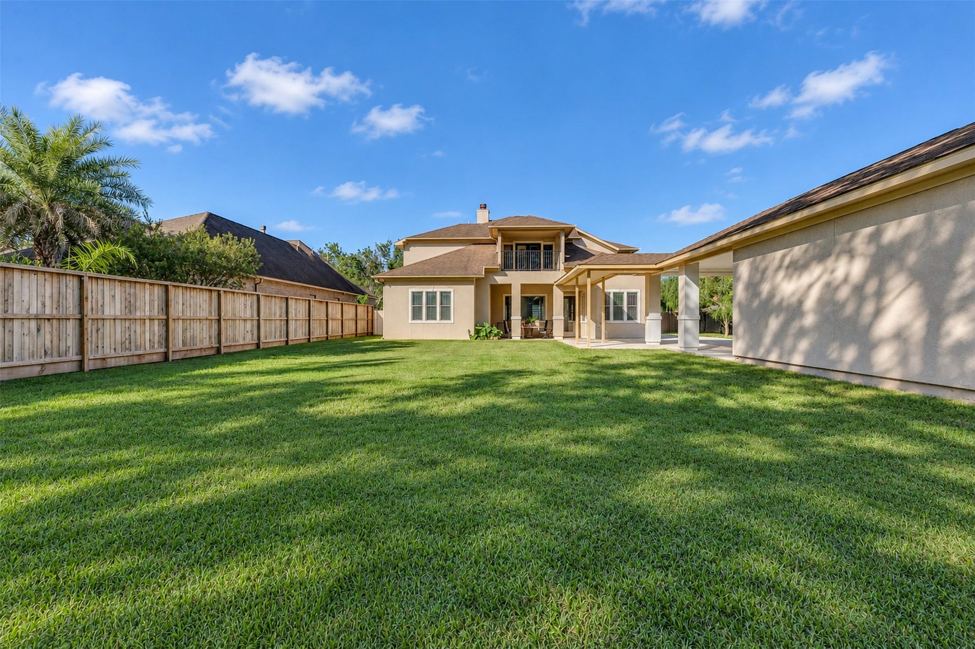 8606 Argentina Street, Houston, TX 77040 Backyard: A generously sized backyard offers space for outdoor seating, gardening, and entertaining.