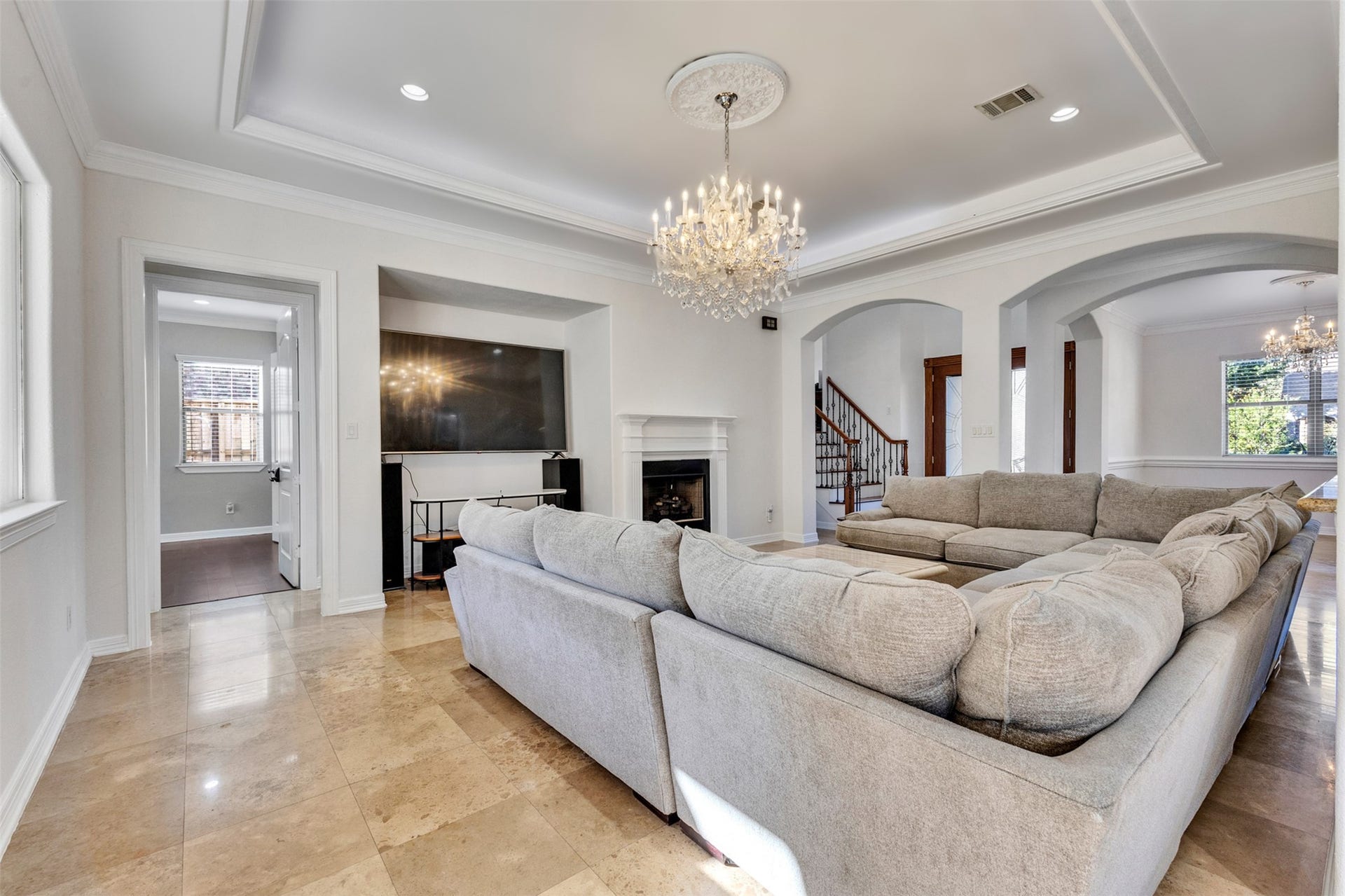 8606 Argentina Street, Houston, TX 77040 A charming gas log fireplace creates a warm, inviting focal point in the living room.