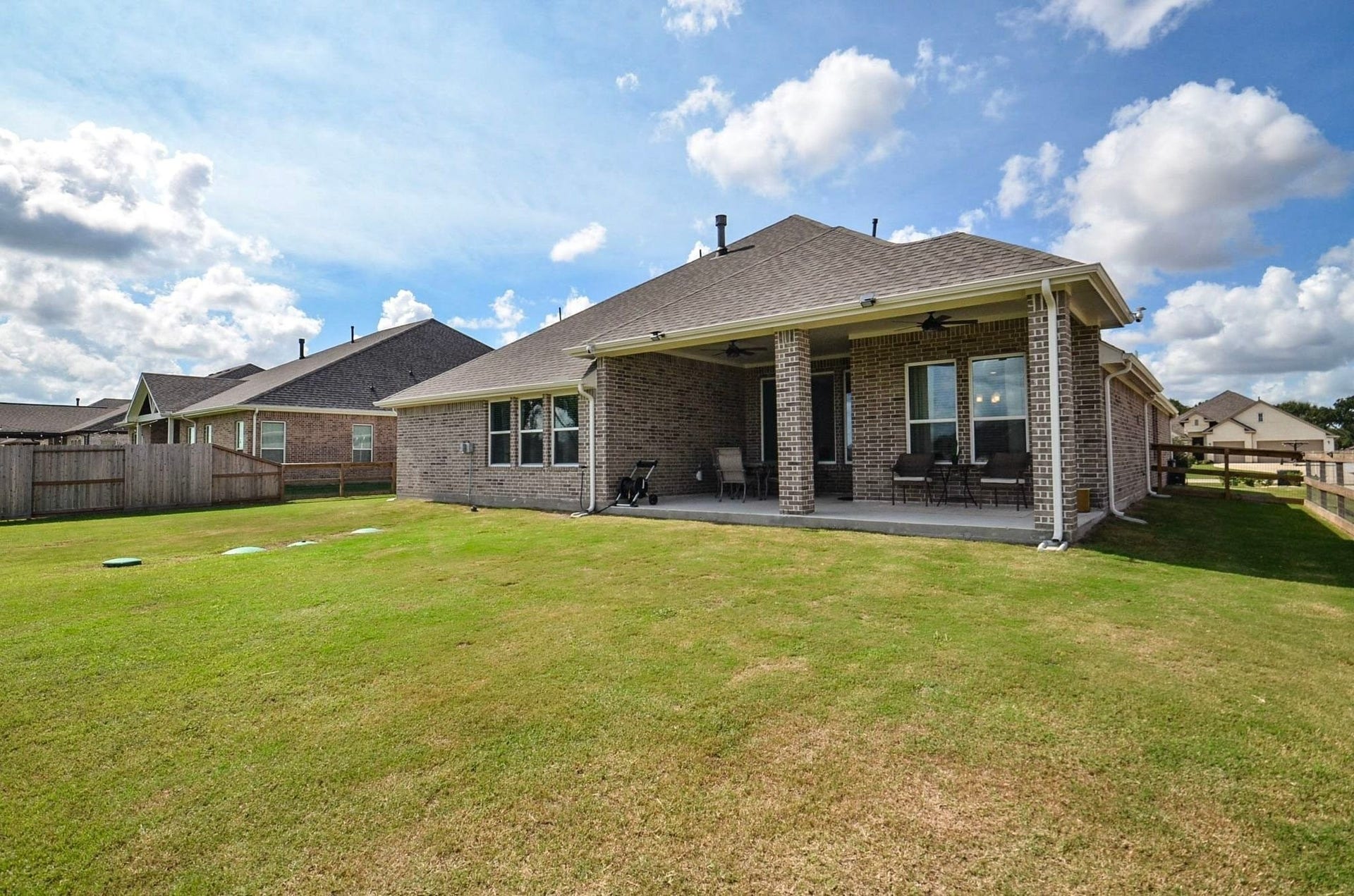 6803 Nichols Landing, Needville, TX 77461 View of the covered patio- multiple areas to sit and relax