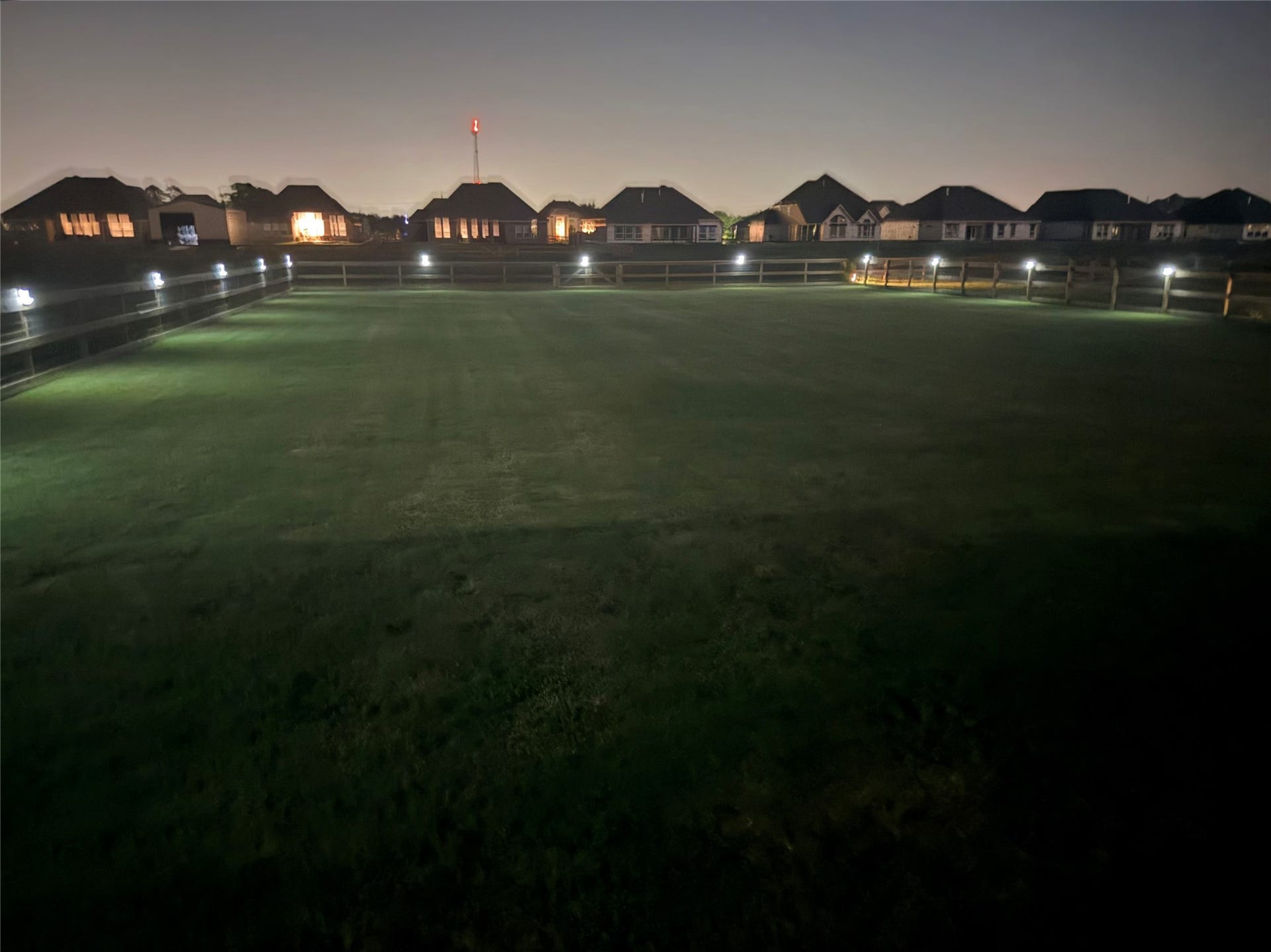 6803 Nichols Landing, Needville, TX 77461 Love this night shot- motion lights all around the fence