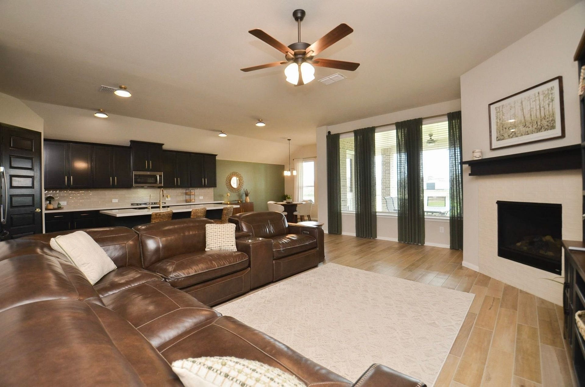 6803 Nichols Landing, Needville, TX 77461 Great view of the family room, kitchen and breakfast room- perfect home for entertaining friends and family