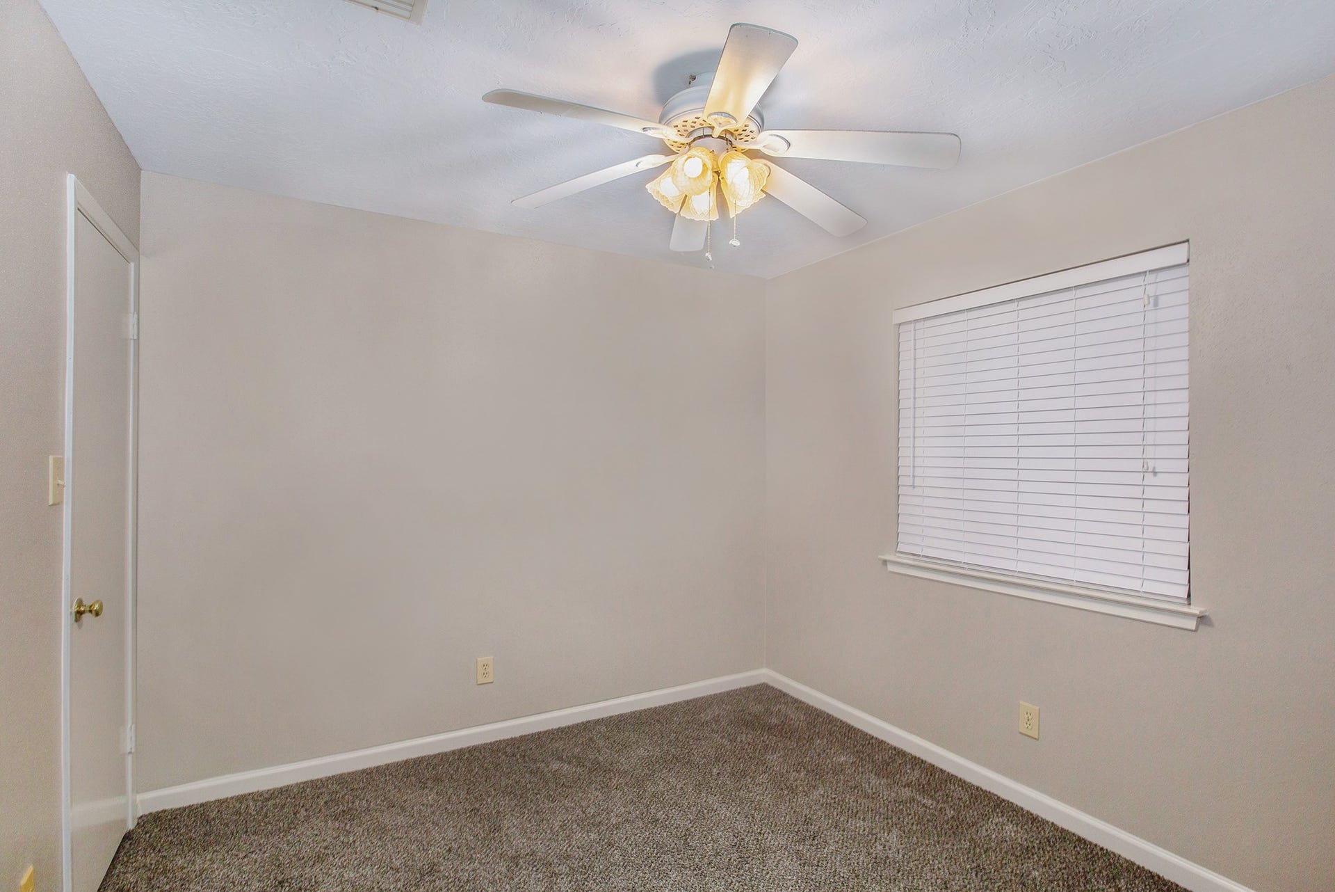 17002 Sky Blue Place, Houston, TX 77095 Secondary bedroom with plush carpet and ceiling fan.