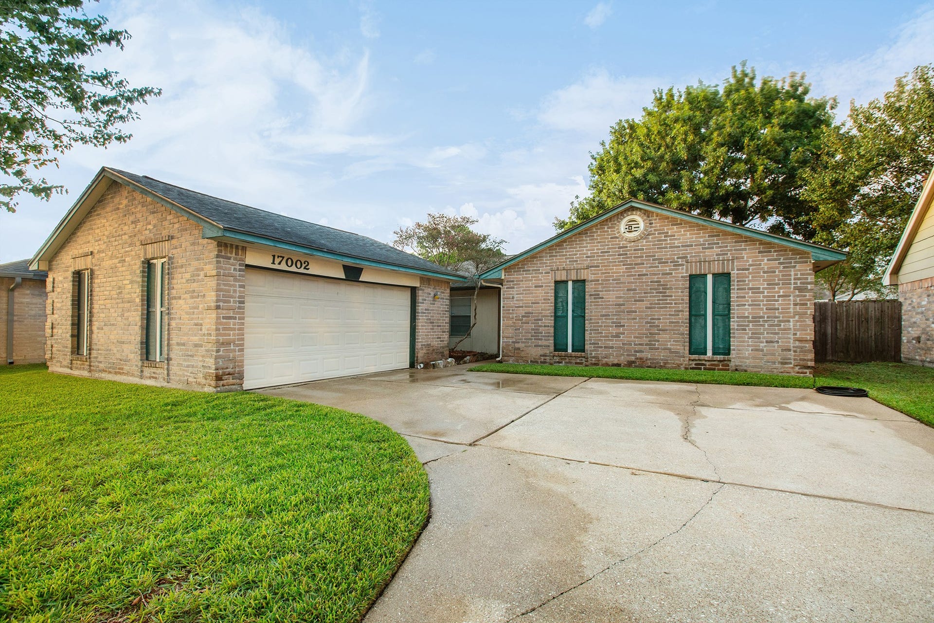 17002 Sky Blue Place, Houston, TX 77095 2-car garage provides plenty of room for parking.