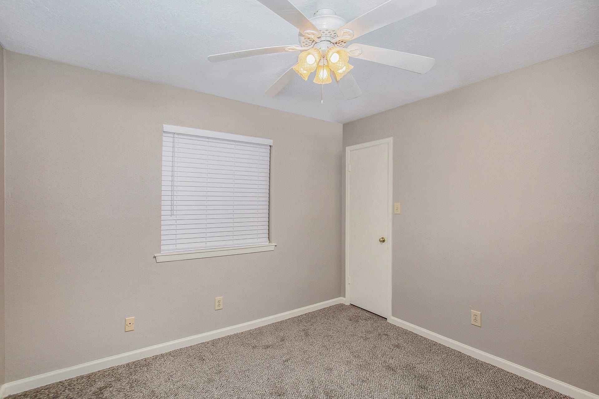 17002 Sky Blue Place, Houston, TX 77095 Secondary bedroom with plush carpet and ceiling fan.