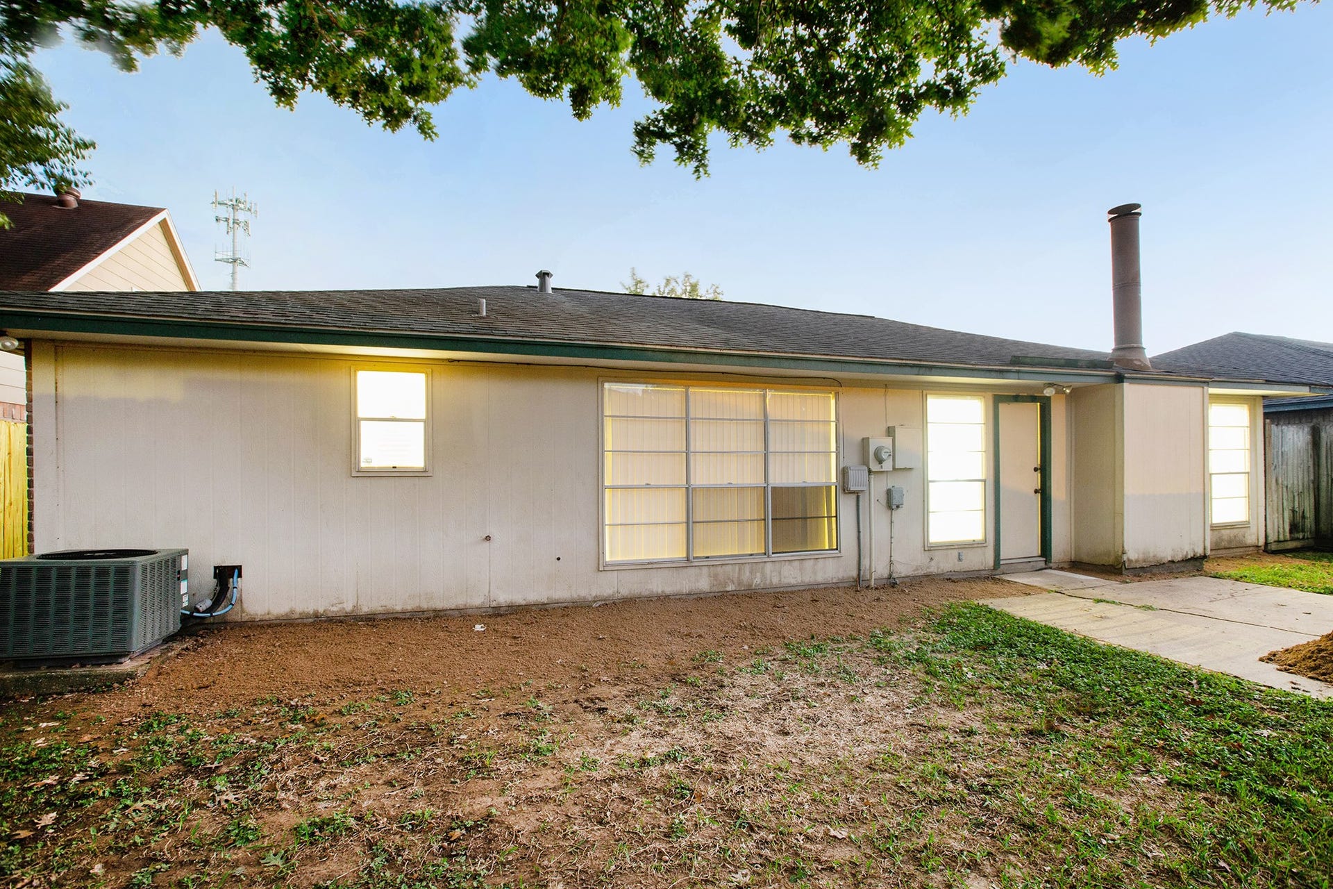 17002 Sky Blue Place, Houston, TX 77095 Backyard with patio area.