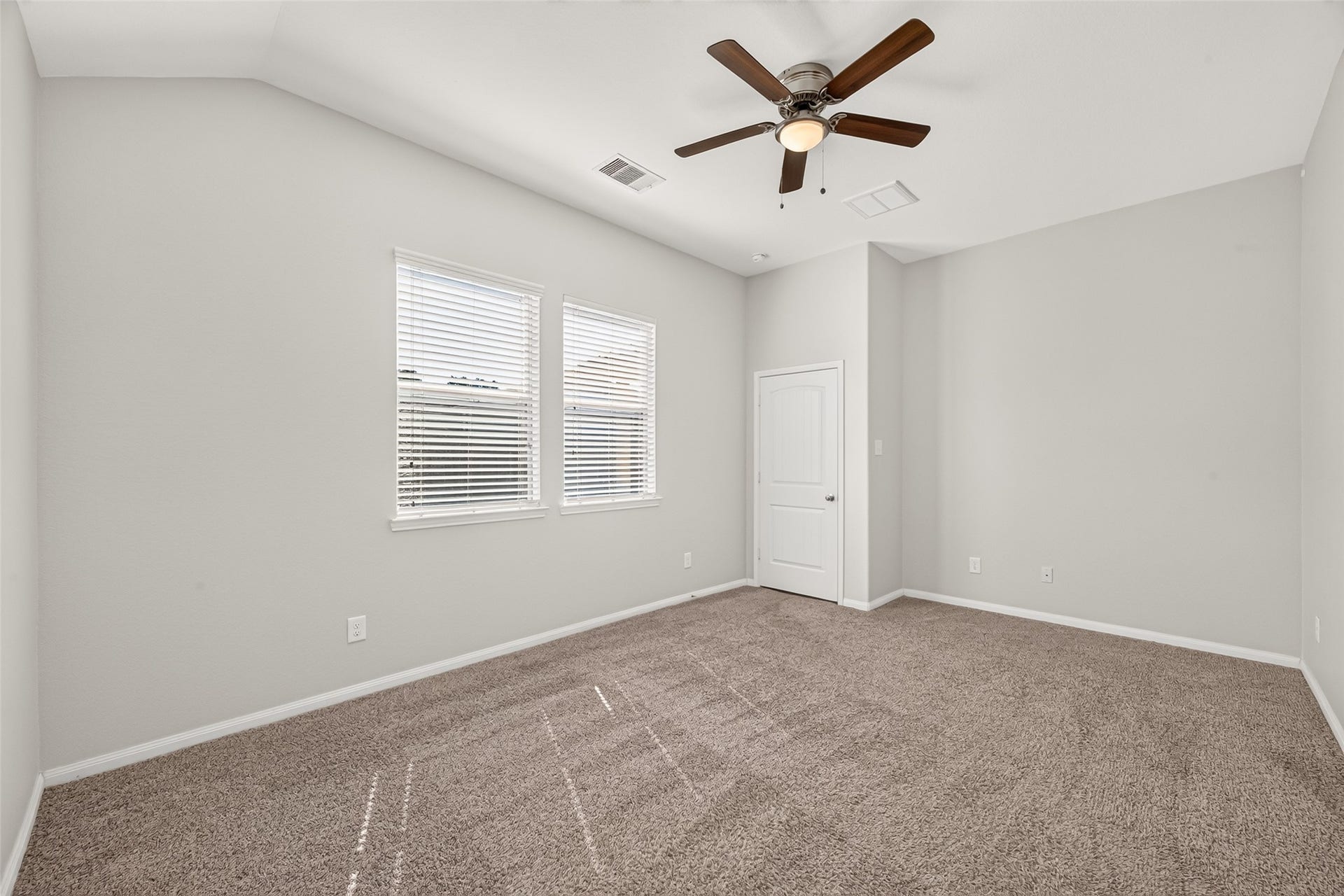 1018 Pleasant Bend, Conroe, TX 77301 Another view of the primary bedroom, located just off the main living area.