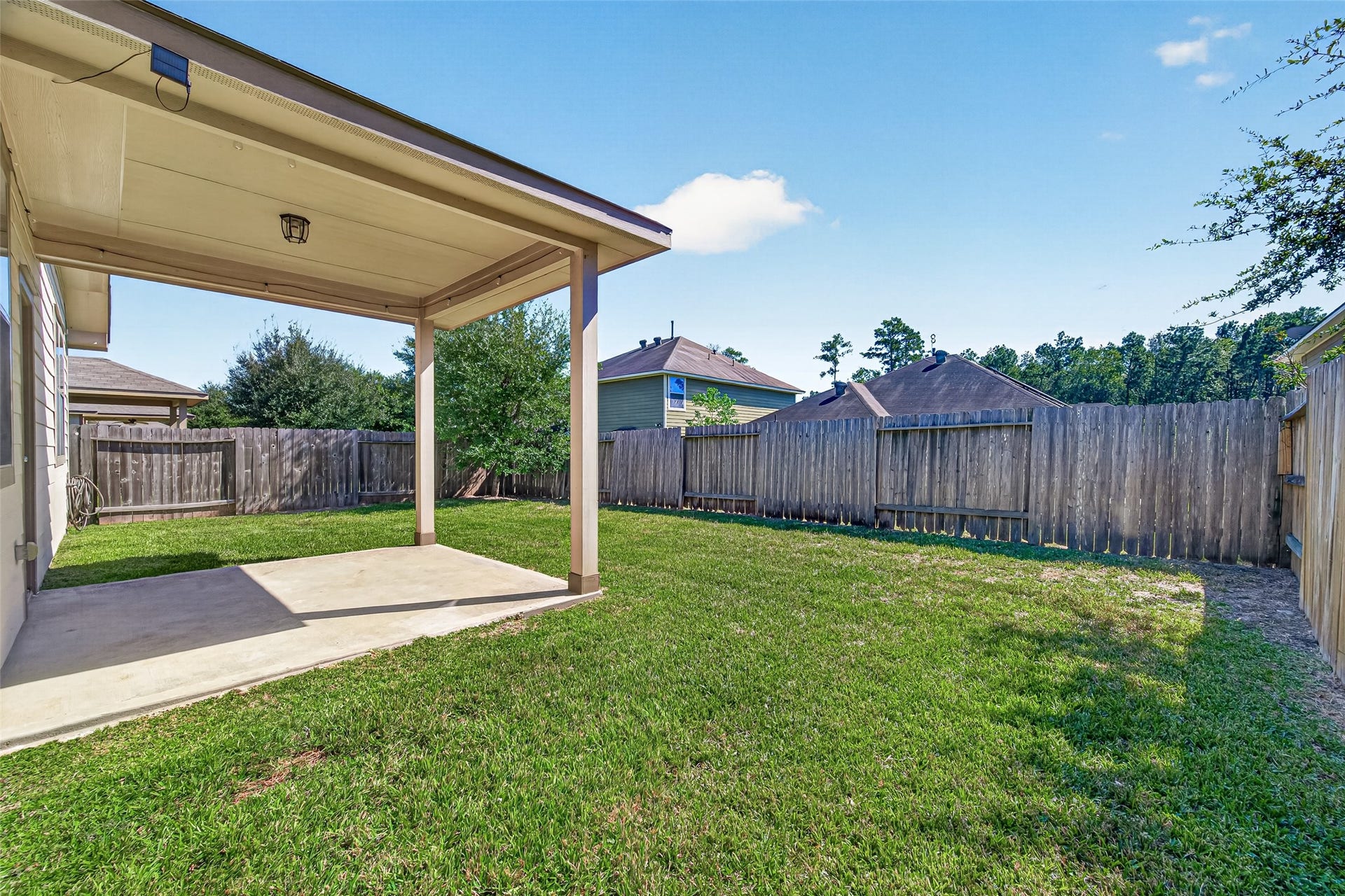 1018 Pleasant Bend, Conroe, TX 77301 There is plenty of room to make the most of your time outside.