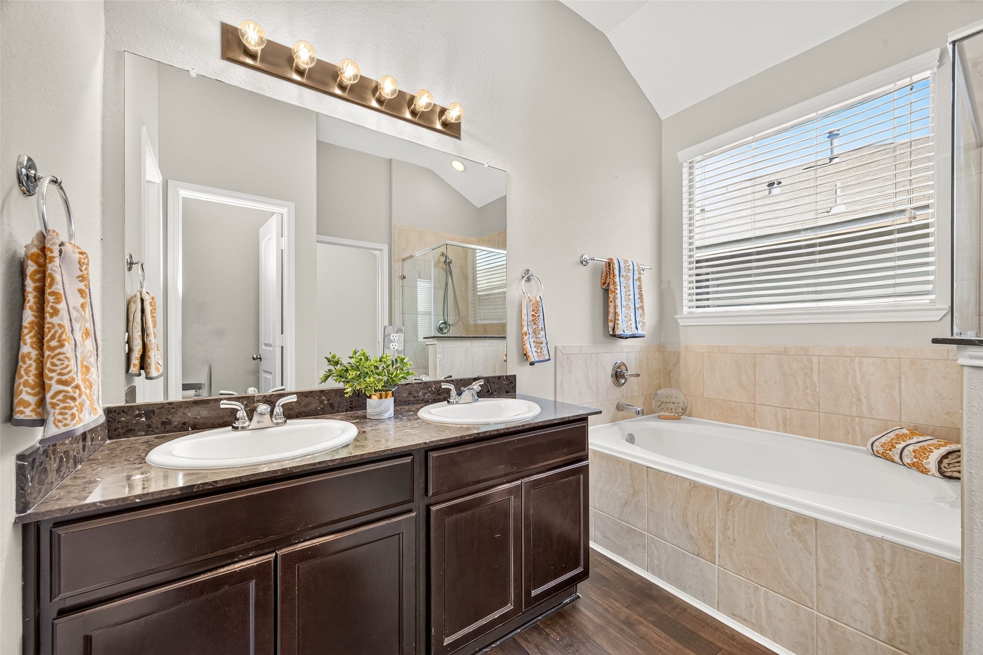 1018 Pleasant Bend, Conroe, TX 77301 Natural light brightens the bathroom - with double-sink vanity and plenty of countertop space for your daily routine
