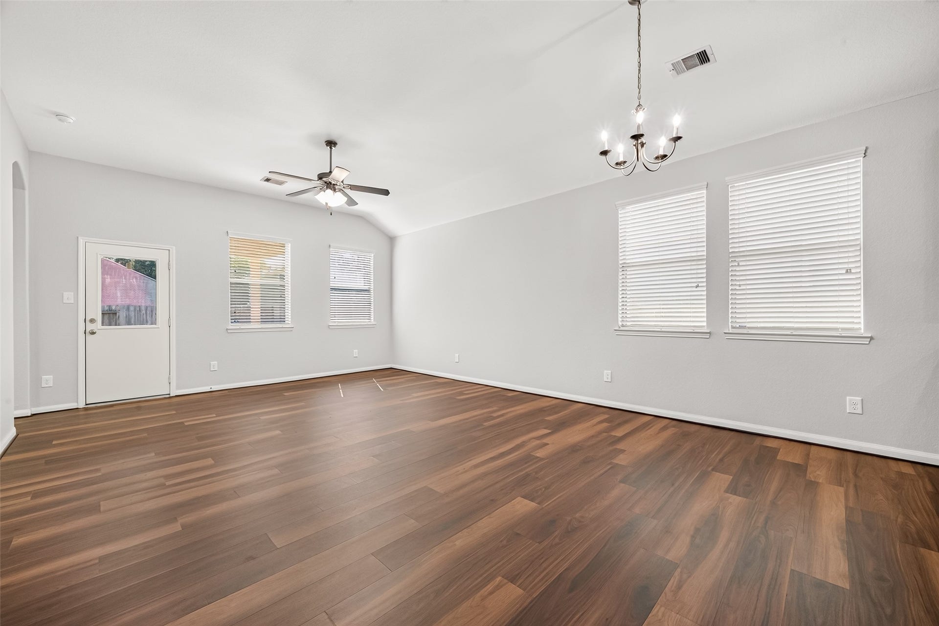 1018 Pleasant Bend, Conroe, TX 77301 Natural light pours through the living room windows, giving the space a bright and cheerful feel.