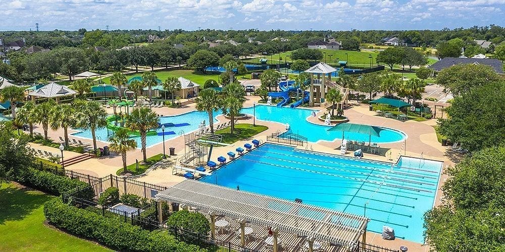10718 Hidden Rock Drive, Missouri City, TX 77459 Club Sienna Water Park delivers resort-style fun with expansive pools, water features and recreation areas that make staying close to home feel like a getaway.