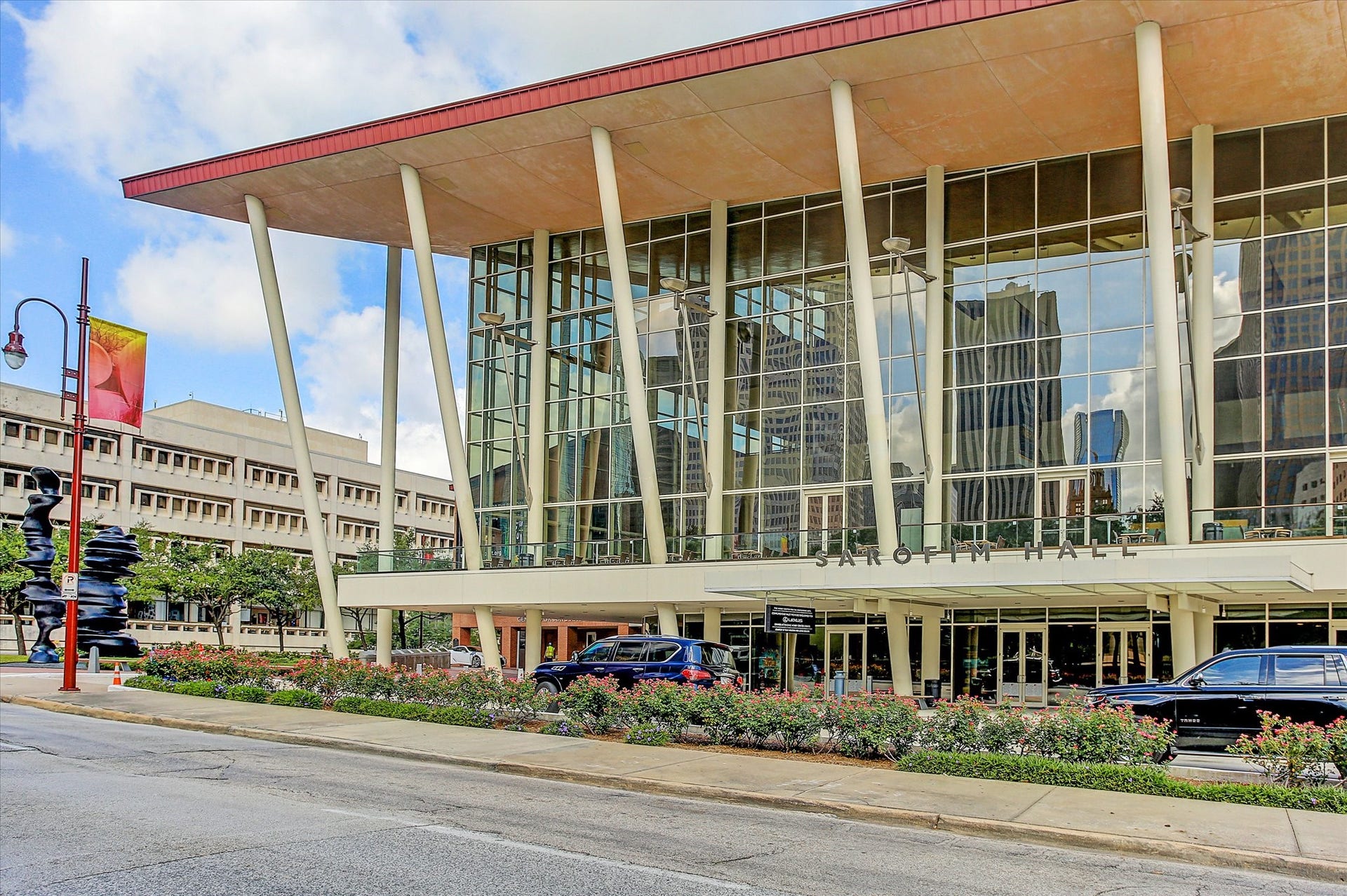 1111 Caroline Street, #2606, Houston, TX 77010 Sarofim Hall, the crown jewel of the Hobby Center for the Performing Arts, is celebrated for its sweeping glass faade and world-class productions. Home to Broadway Across America and Houstons own Theatre Under the Stars, the venue brings acclaimed musicals, plays, and performances to the heart of downtown. Its striking modern design and vibrant programming make it a cultural landmark.