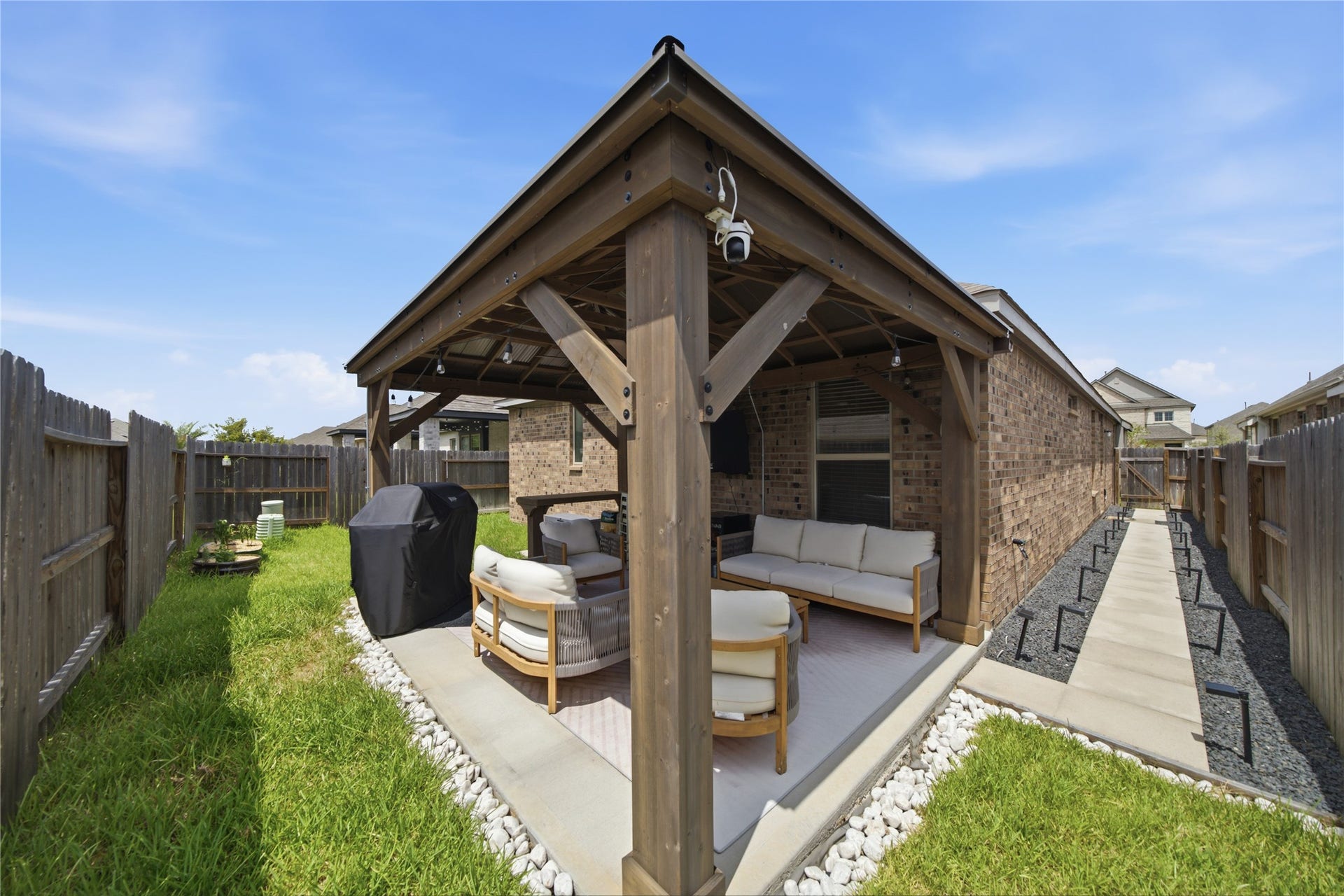 4919 Sand Clouds Drive, Katy, TX 77493 A custom build covered porch is an amazing feature of this home.