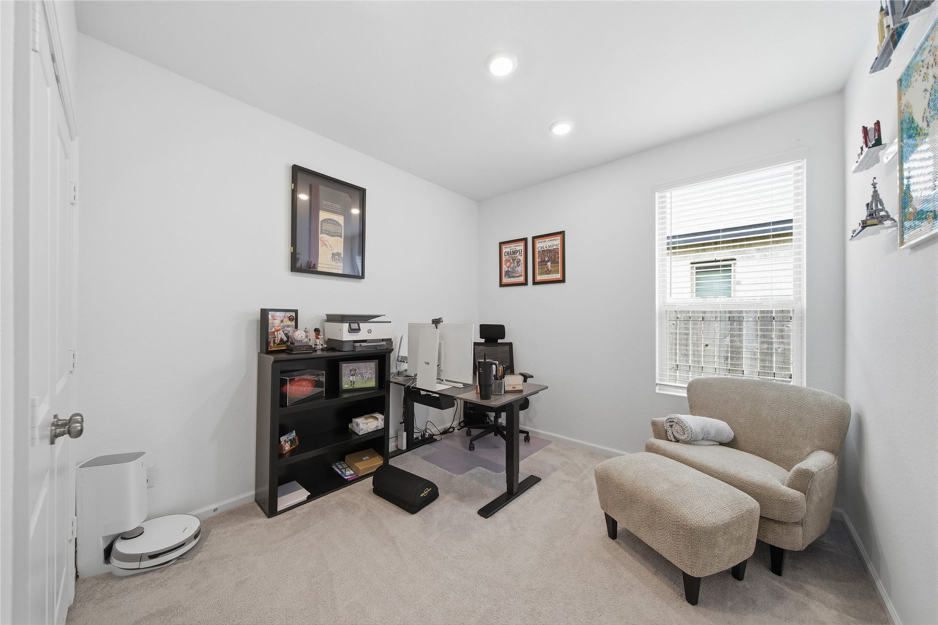 4919 Sand Clouds Drive, Katy, TX 77493 This secondary bedroom currently used as an office features carpet and a large closet.