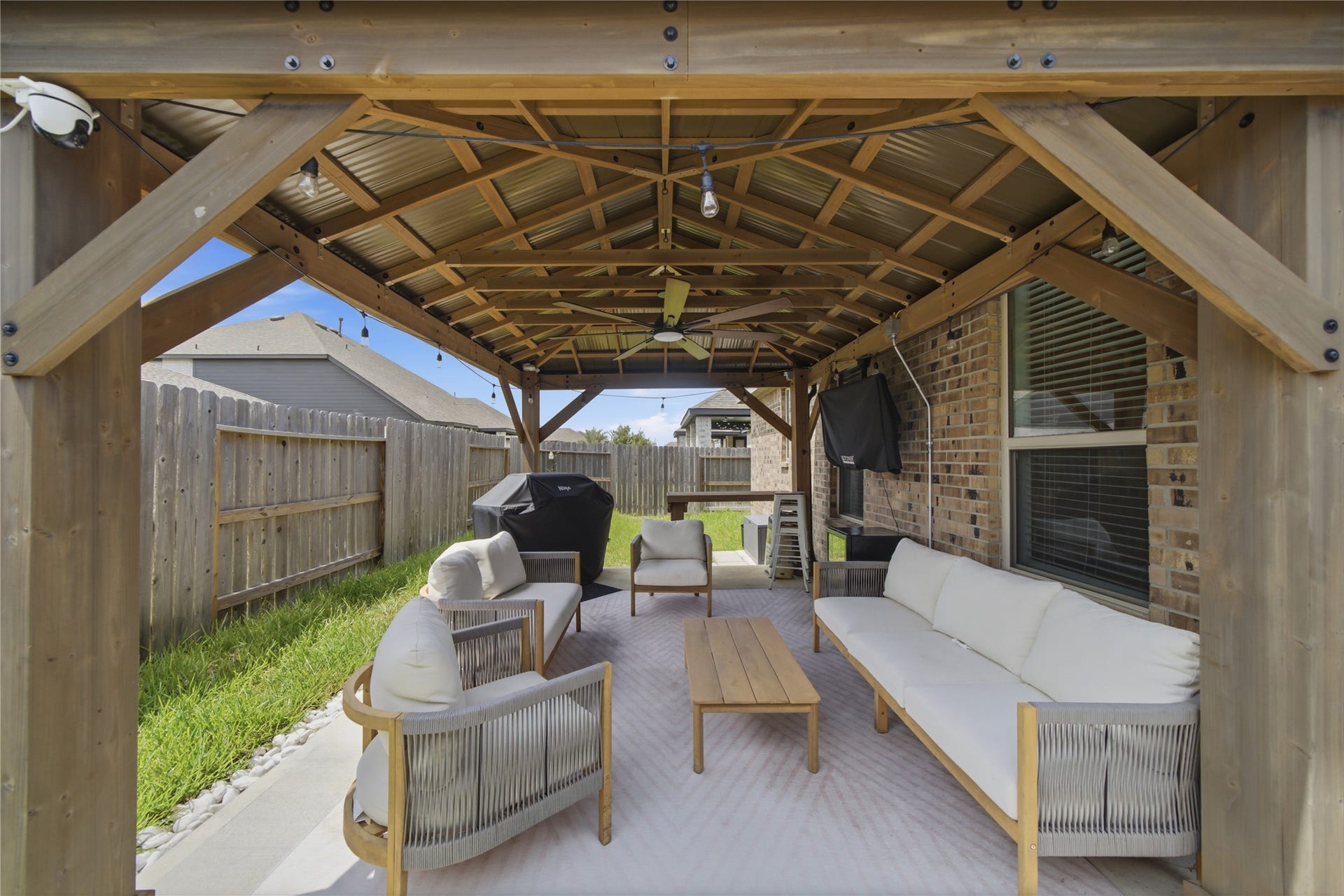 4919 Sand Clouds Drive, Katy, TX 77493 This12x16 patio is equipped with outlets and smart fan.