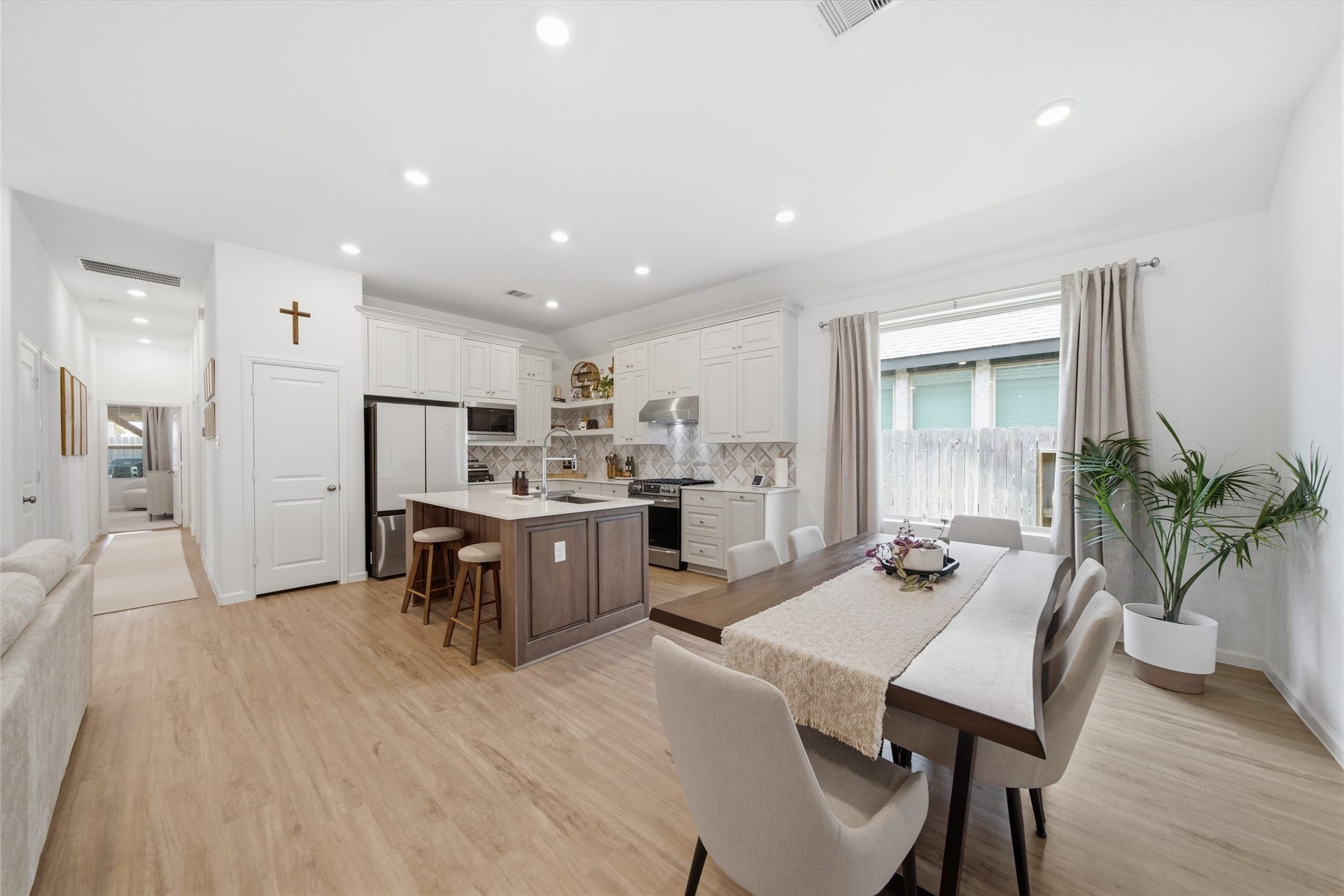 4919 Sand Clouds Drive, Katy, TX 77493 The kitchen and dining area are open to the home that is perfect for entertaining and relaxation.