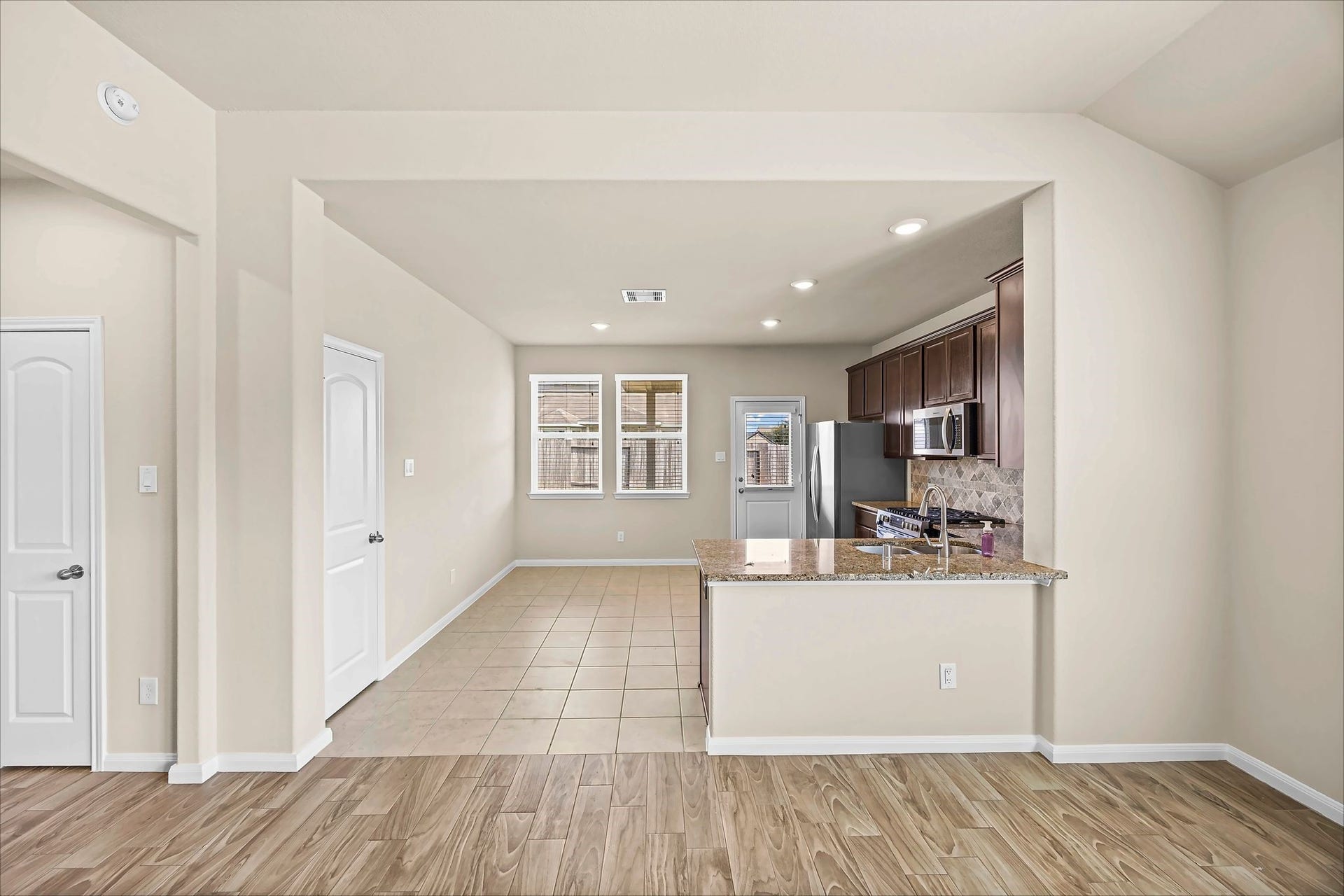 Make everyday meals and special moments feel at home in the dining area beside the kitchen.