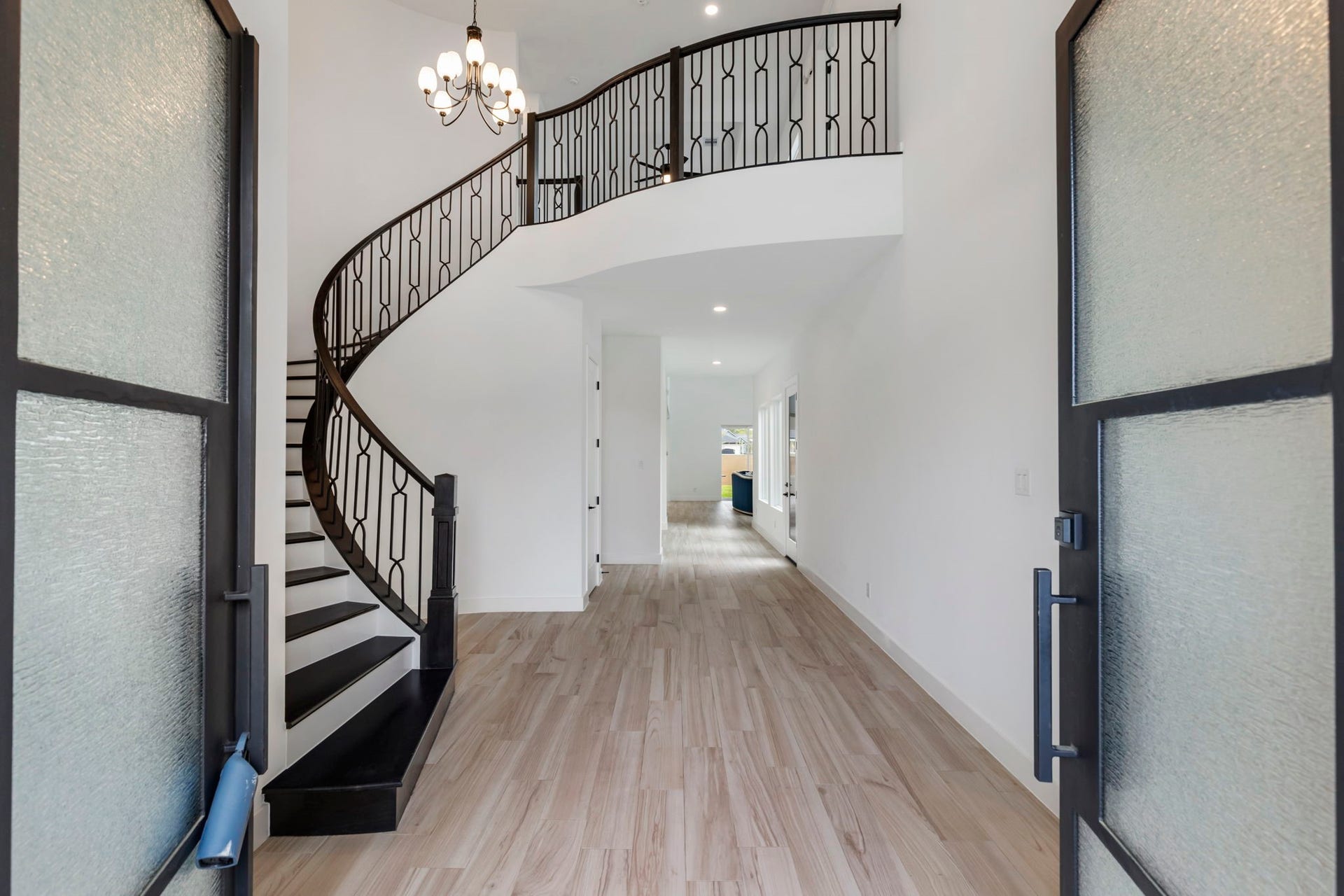 24739 Trull Brook Lane, Spring, TX 77389 Grand Entry with curved staircase.