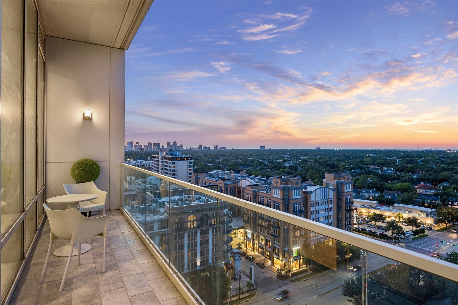 [Private Balcony #2] Enjoy quiet mornings from the primary suite's private balcony with sweeping views of River Oaks.