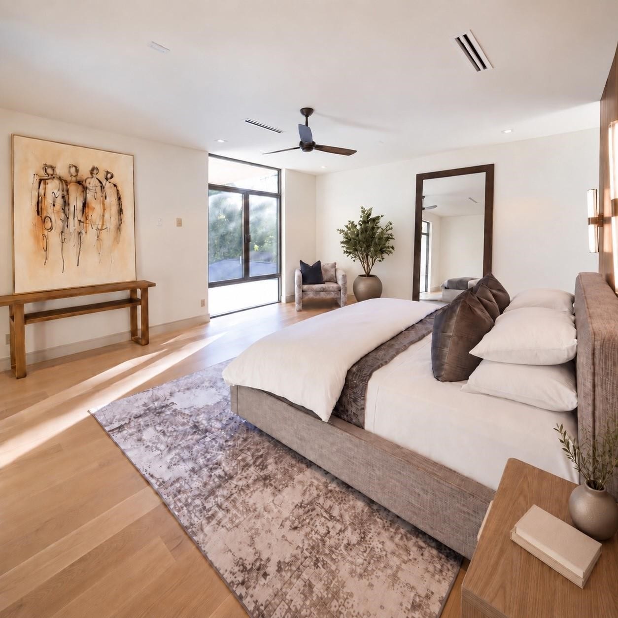 Alternate view of the second floor primary revealing serene retreat wrapped in natural light and treetop views.