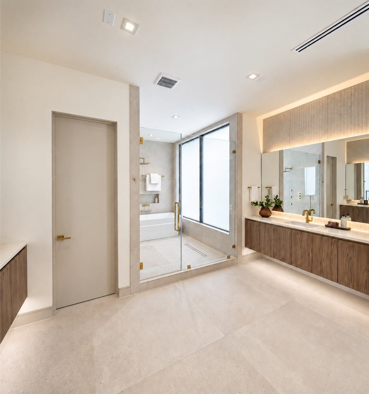 Alternate view of the primary bath. Floating vanities, refined finishes, warm lighting and exceptional separation of space make the entire room feels like it was created just for you.