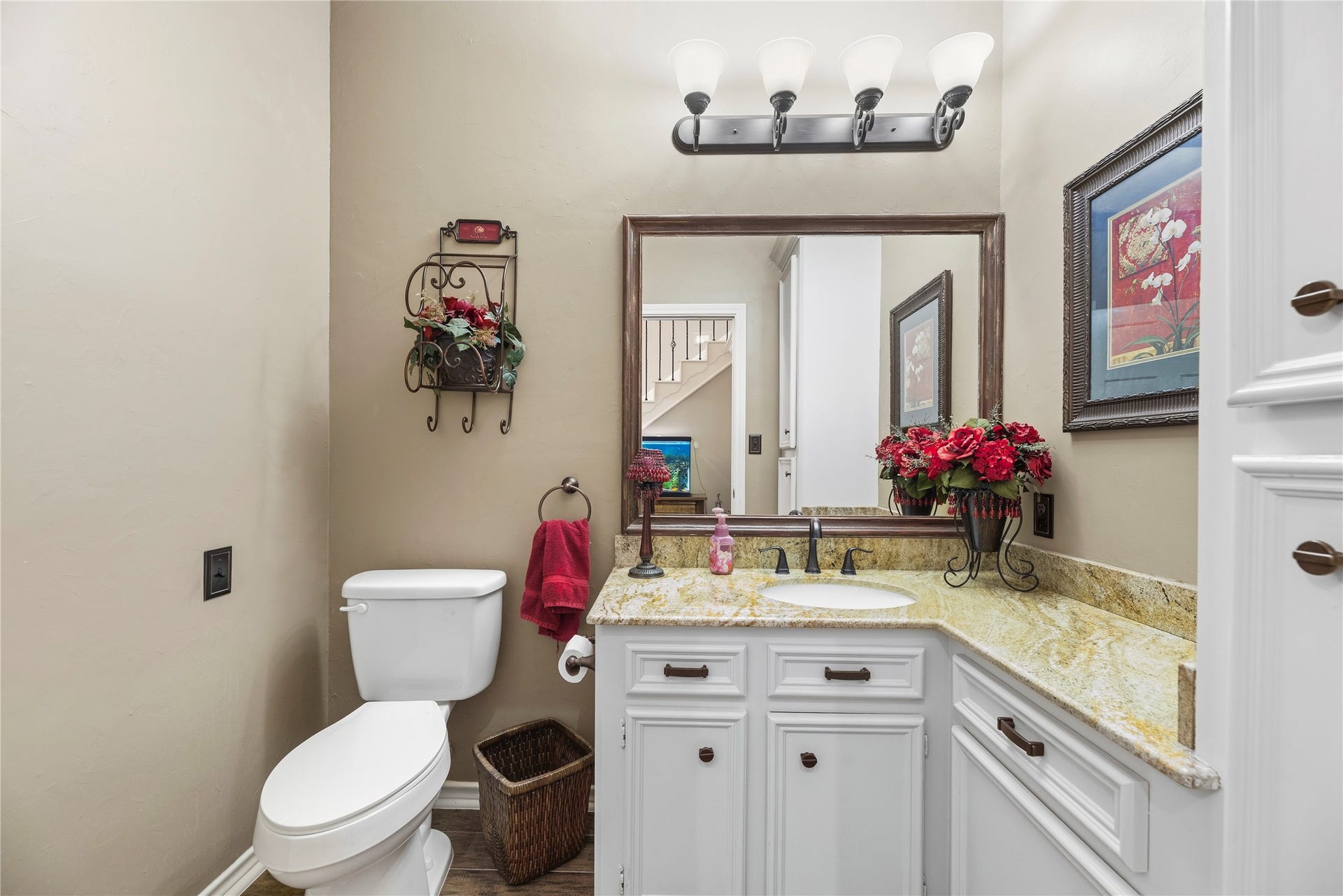 13114 S Winesap Lane, Cypress, TX 77429 Half bath located outside of the kitchen.