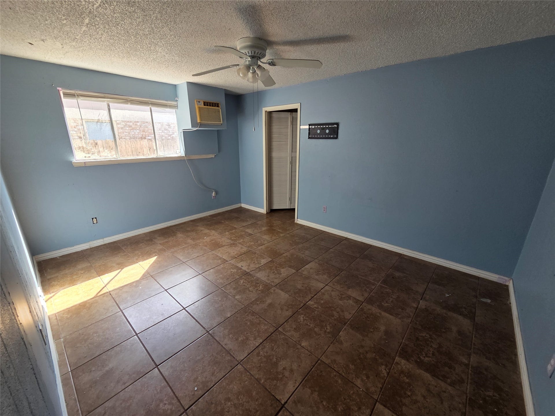 View of master bedroom with master bathroom.