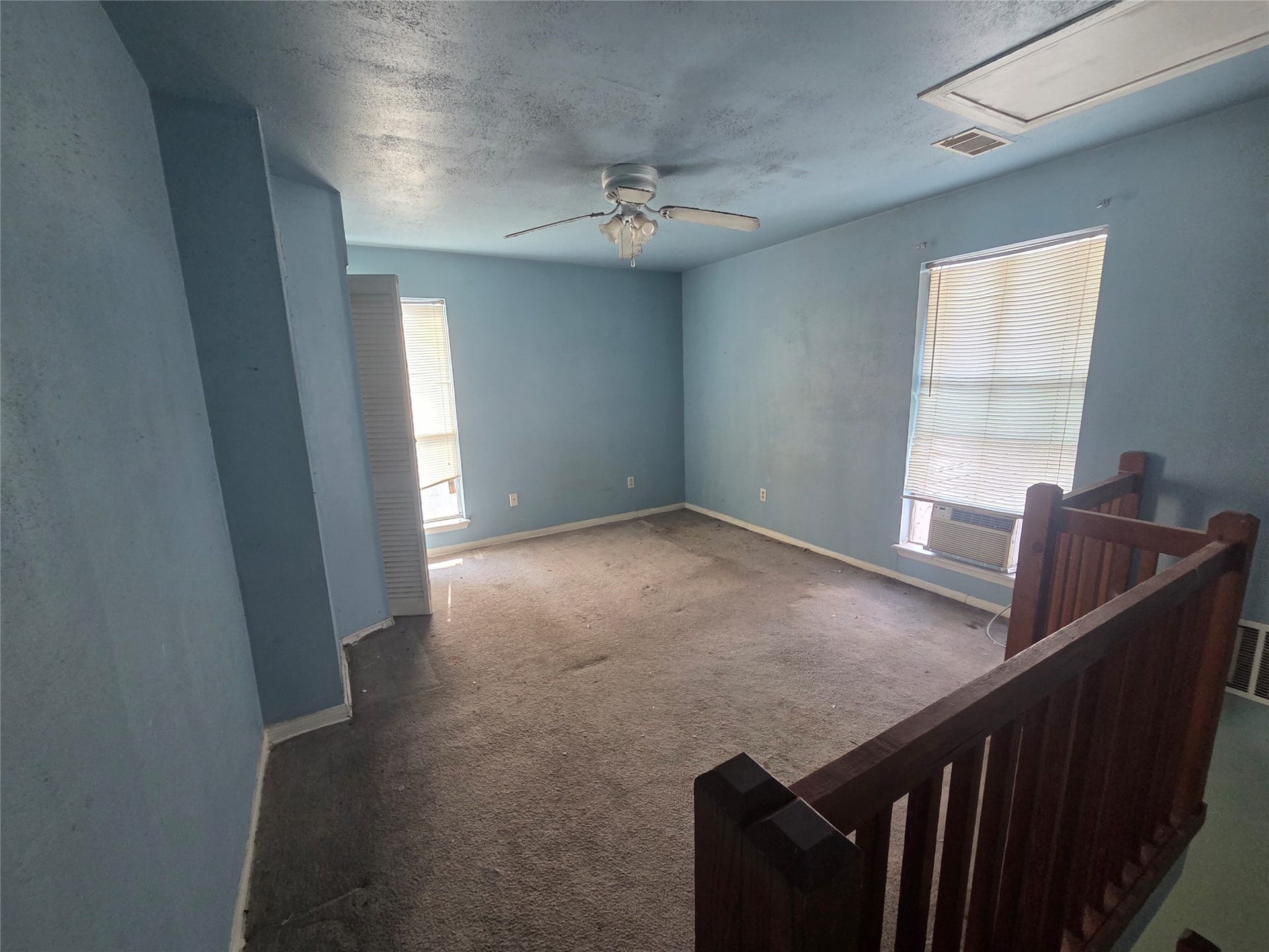 One view of upstairs bedroom.