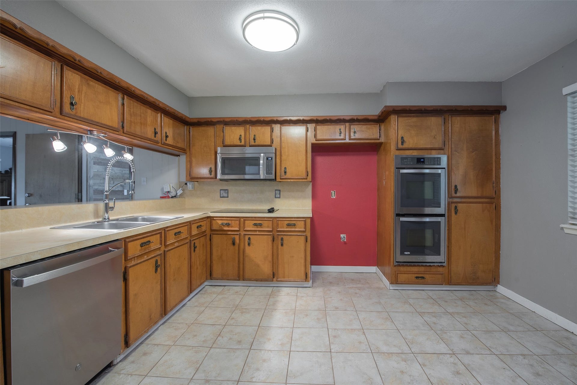 504 Walnut Street, Waller, TX 77484 Kitchen with Stainless Steel Appliances - Built In Microwave, Double Oven, and Dishwasher