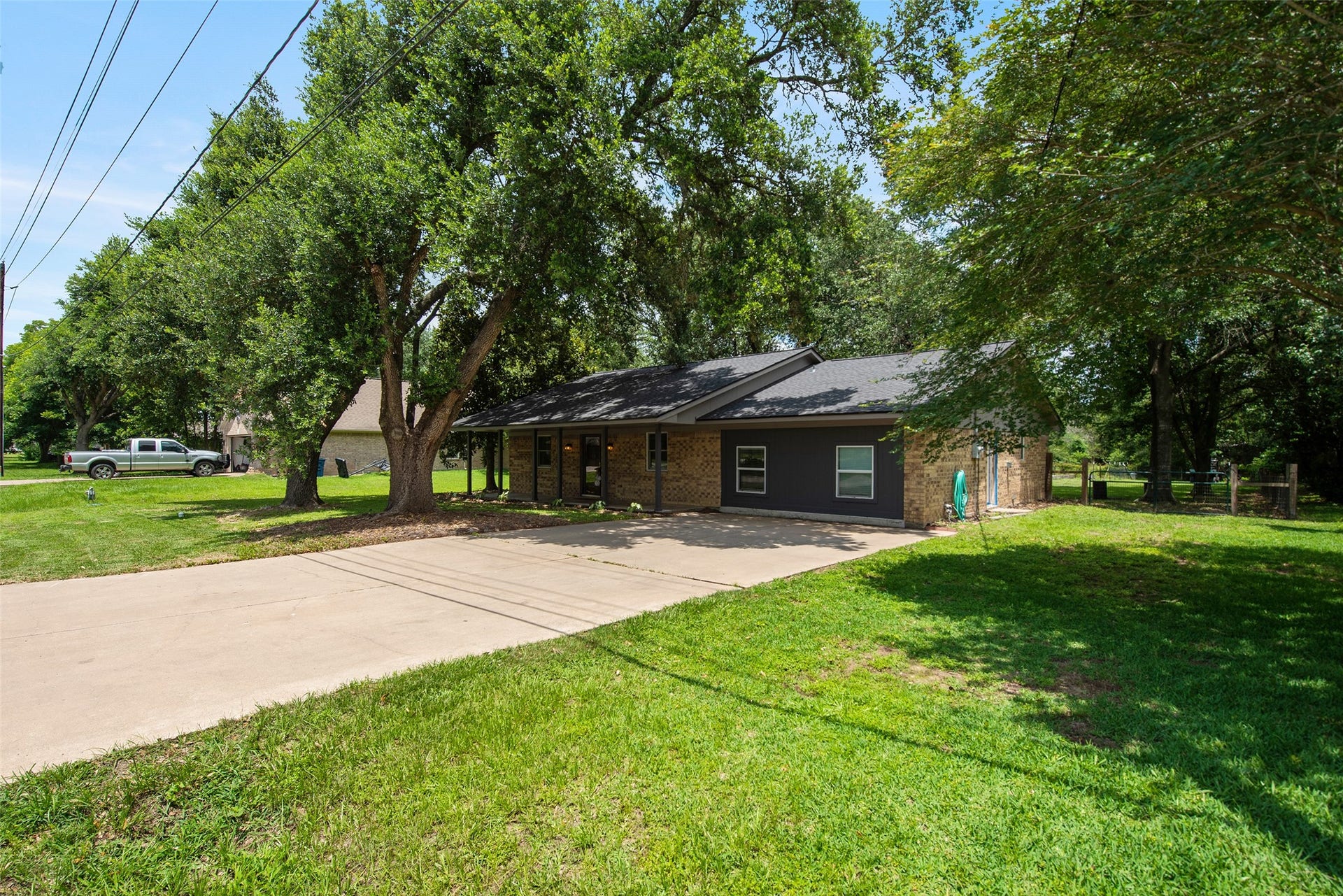504 Walnut Street, Waller, TX 77484 Street View of the Front of the House with Double Wide Driveway
