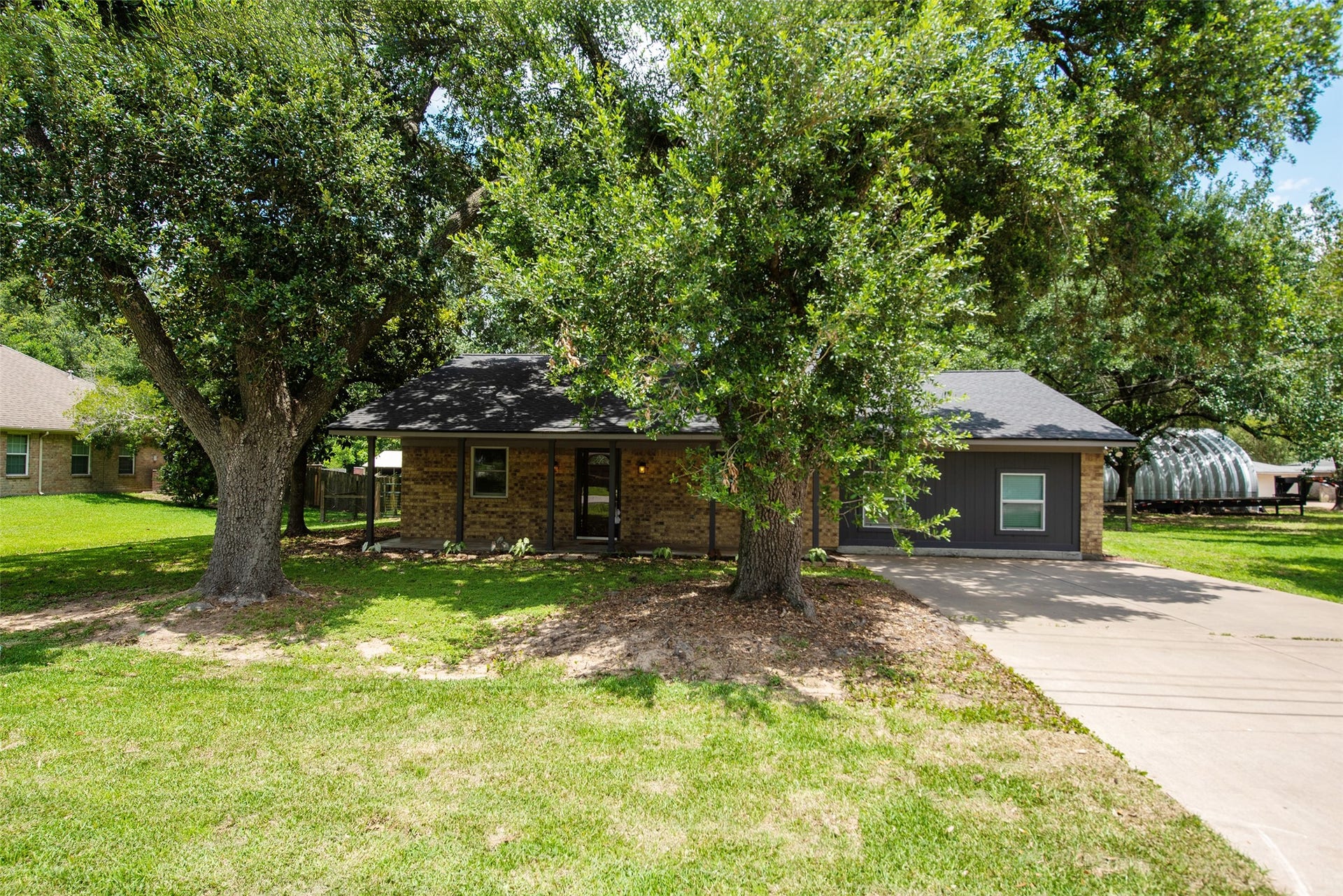 504 Walnut Street, Waller, TX 77484 Street View of the Front of the House with Double Wide Driveway