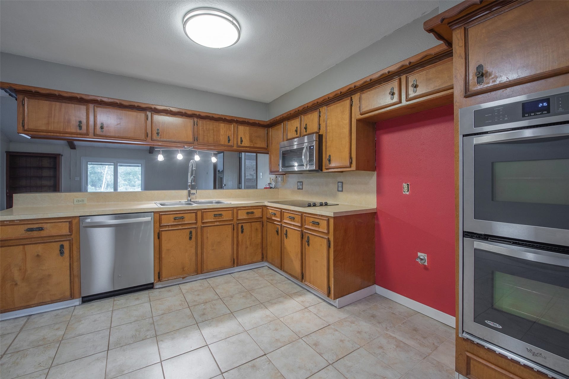 504 Walnut Street, Waller, TX 77484 Kitchen with Stainless Steel Appliances - Built In Microwave, Double Oven, and Dishwasher