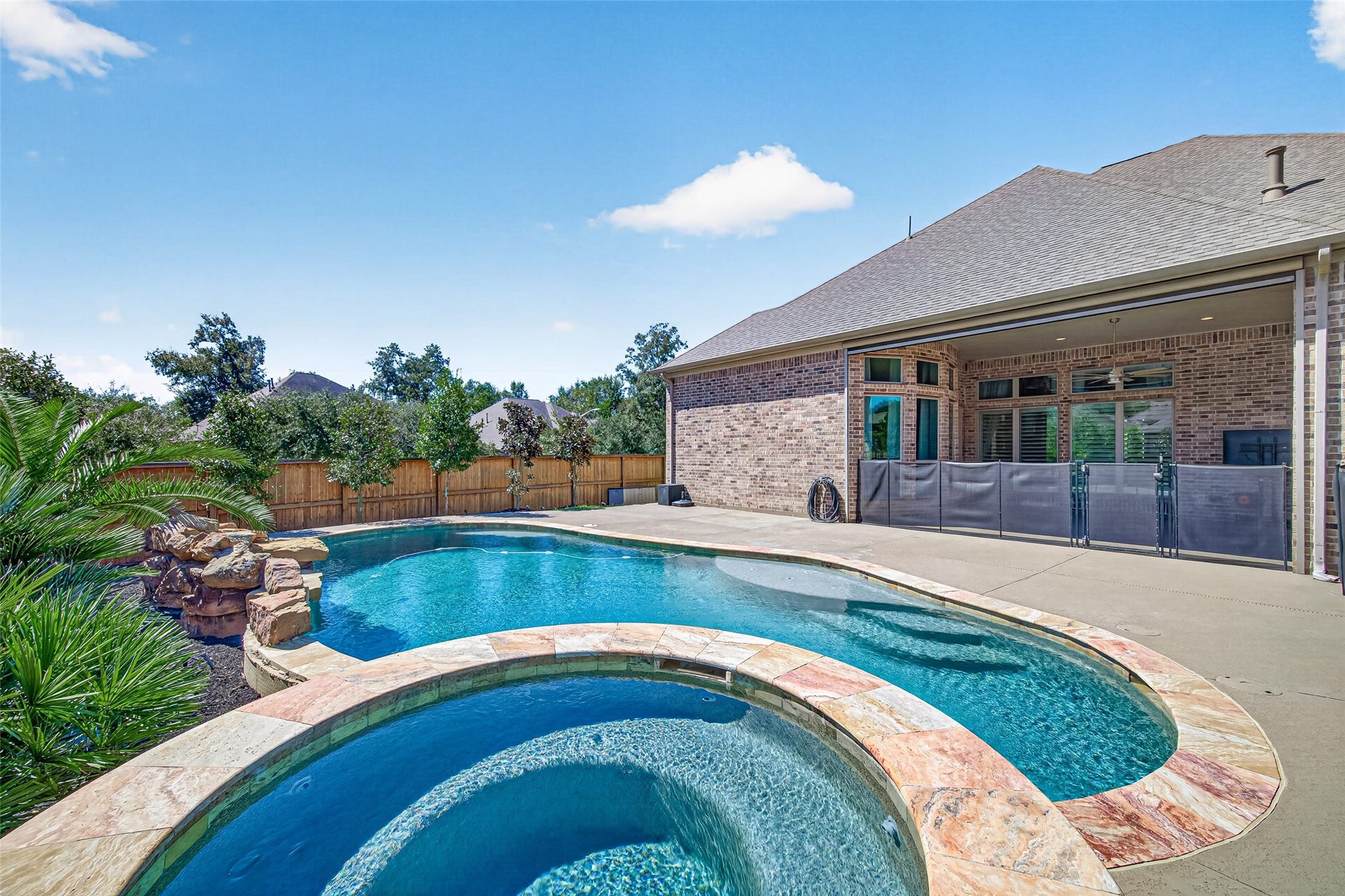 18902 Carson Glen Drive, New Caney, TX 77357 Pool area with safety gate installed