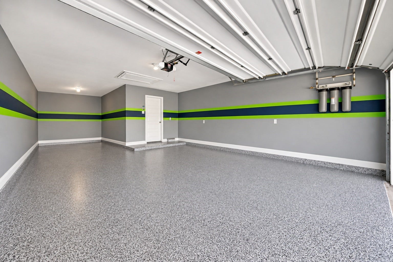 18902 Carson Glen Drive, New Caney, TX 77357 Garage with epoxy coated flooring