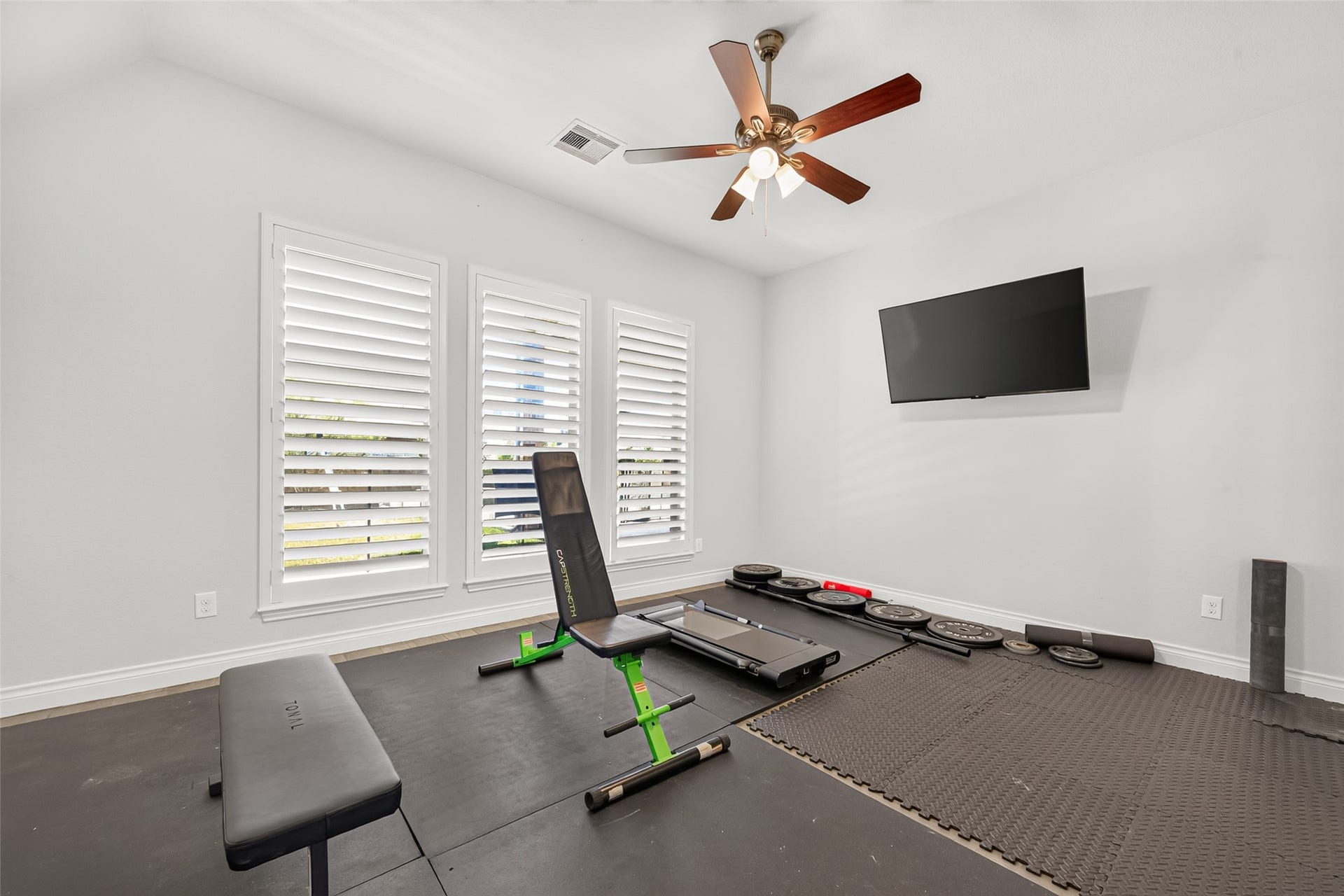 18902 Carson Glen Drive, New Caney, TX 77357 Flex room currently configured as a gym
