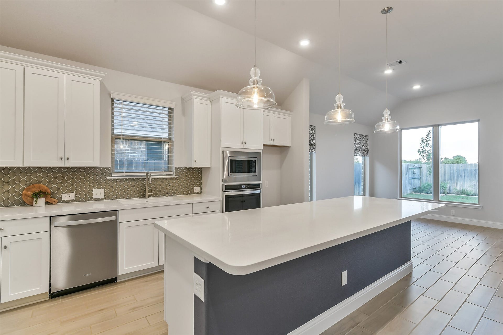 20330 Rose Gray Lane, Tomball, TX 77377 This quartz island has plenty of room for additional seating with barstools.