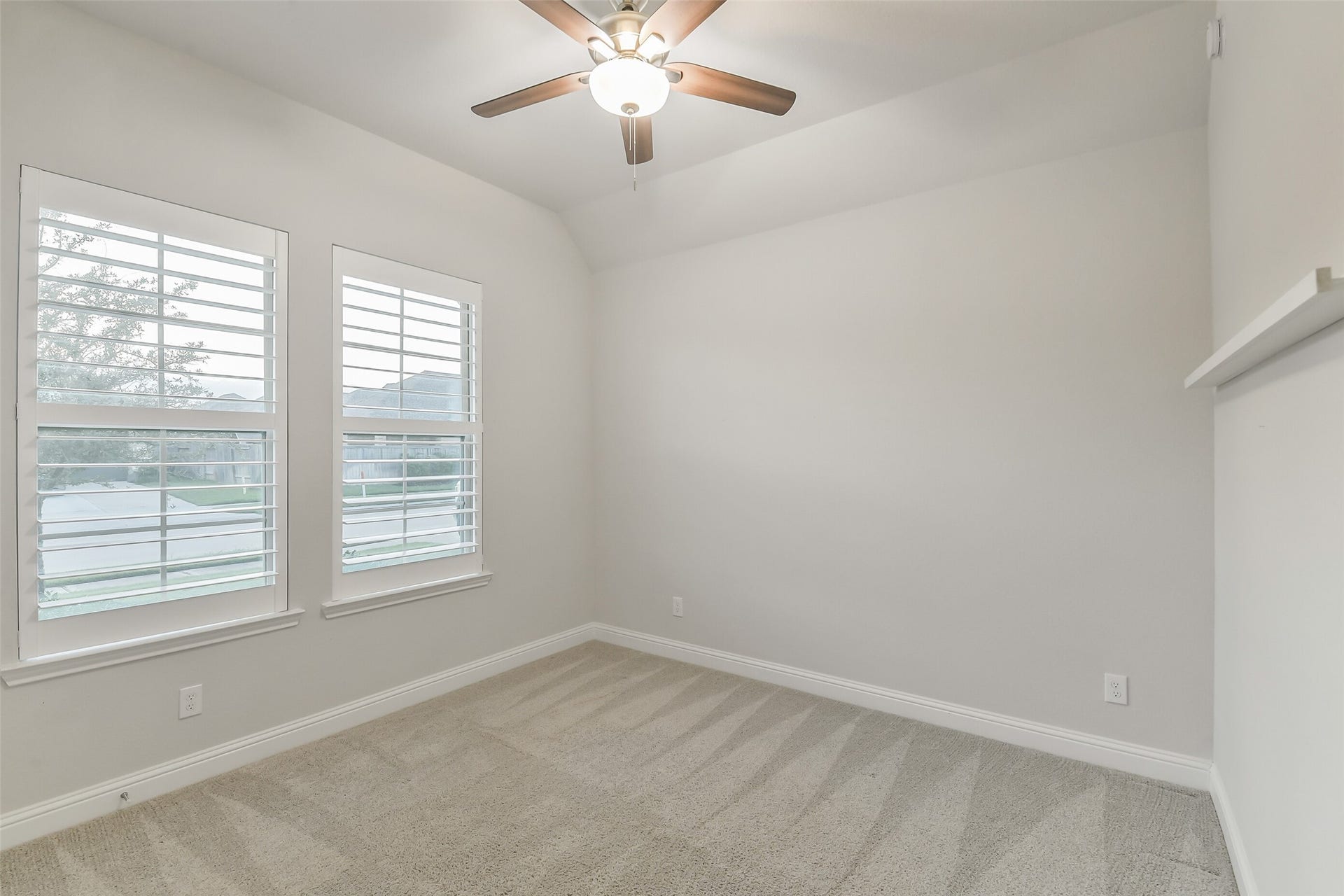 20330 Rose Gray Lane, Tomball, TX 77377 Secondary bedroom #2 with plantation shutters and ceiling fan