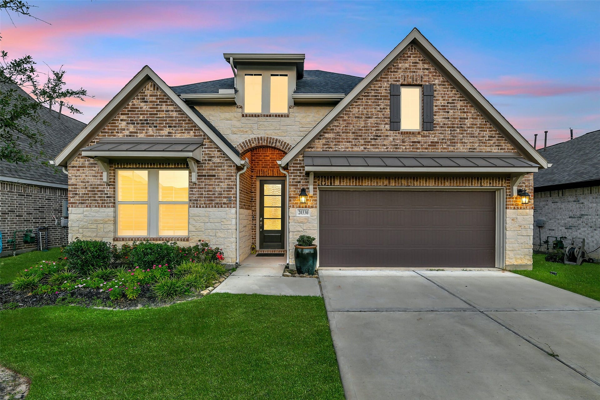 20330 Rose Gray Lane, Tomball, TX 77377 Welcome to 20330 Rose Gray Lane! This gorgeous home features a beautiful brick and stone exterior with easy to maintain landscaping.
