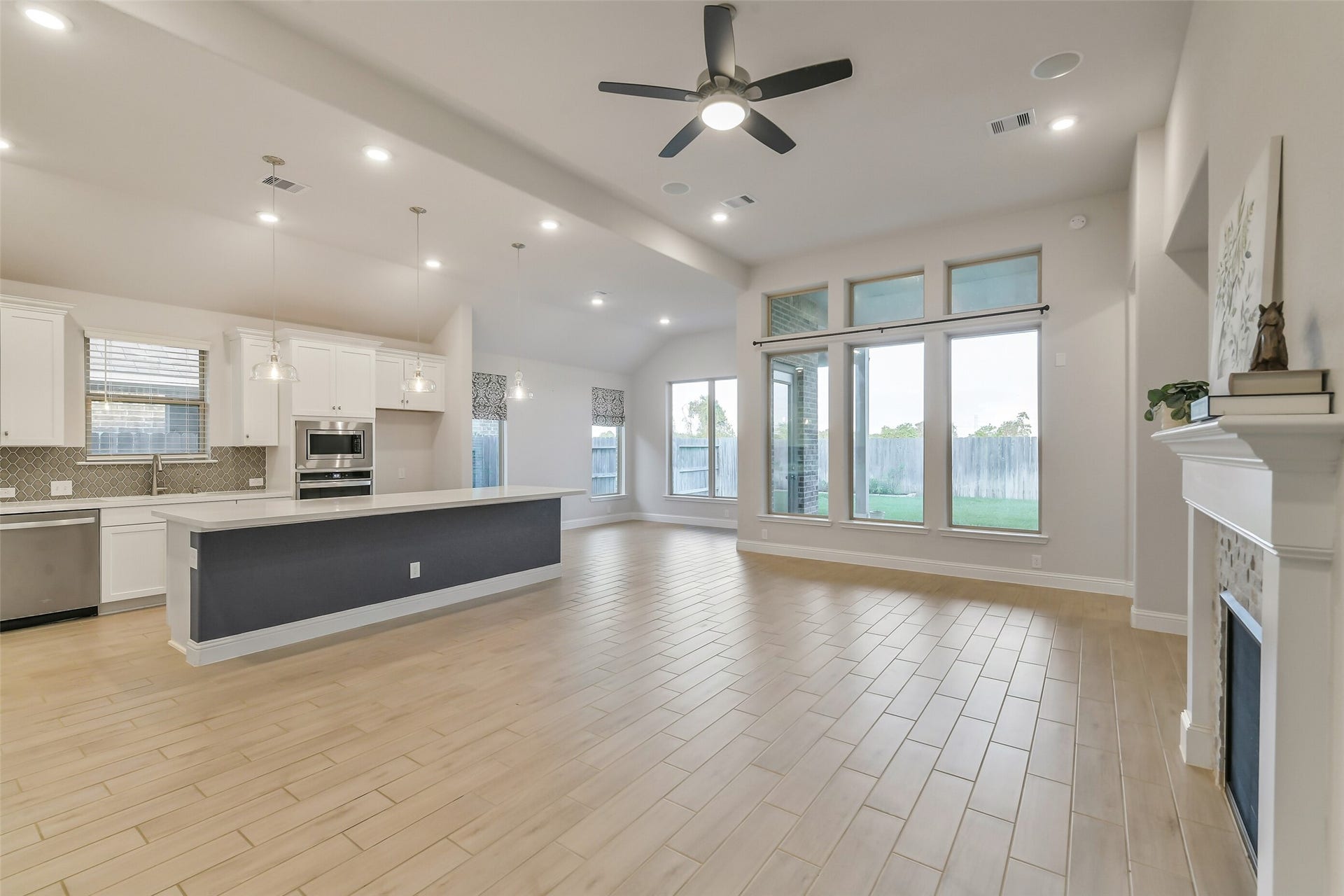 20330 Rose Gray Lane, Tomball, TX 77377 Activities can move seamlessly from area to the next in this open floor plan.