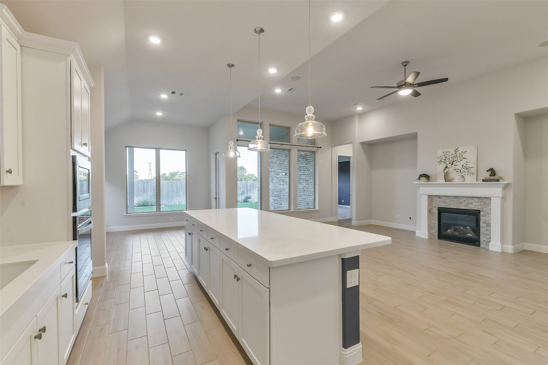 20330 Rose Gray Lane, Tomball, TX 77377 The kitchen flows nicely into the living room and breakfast area, where the cook doesn't feel left out of the action.