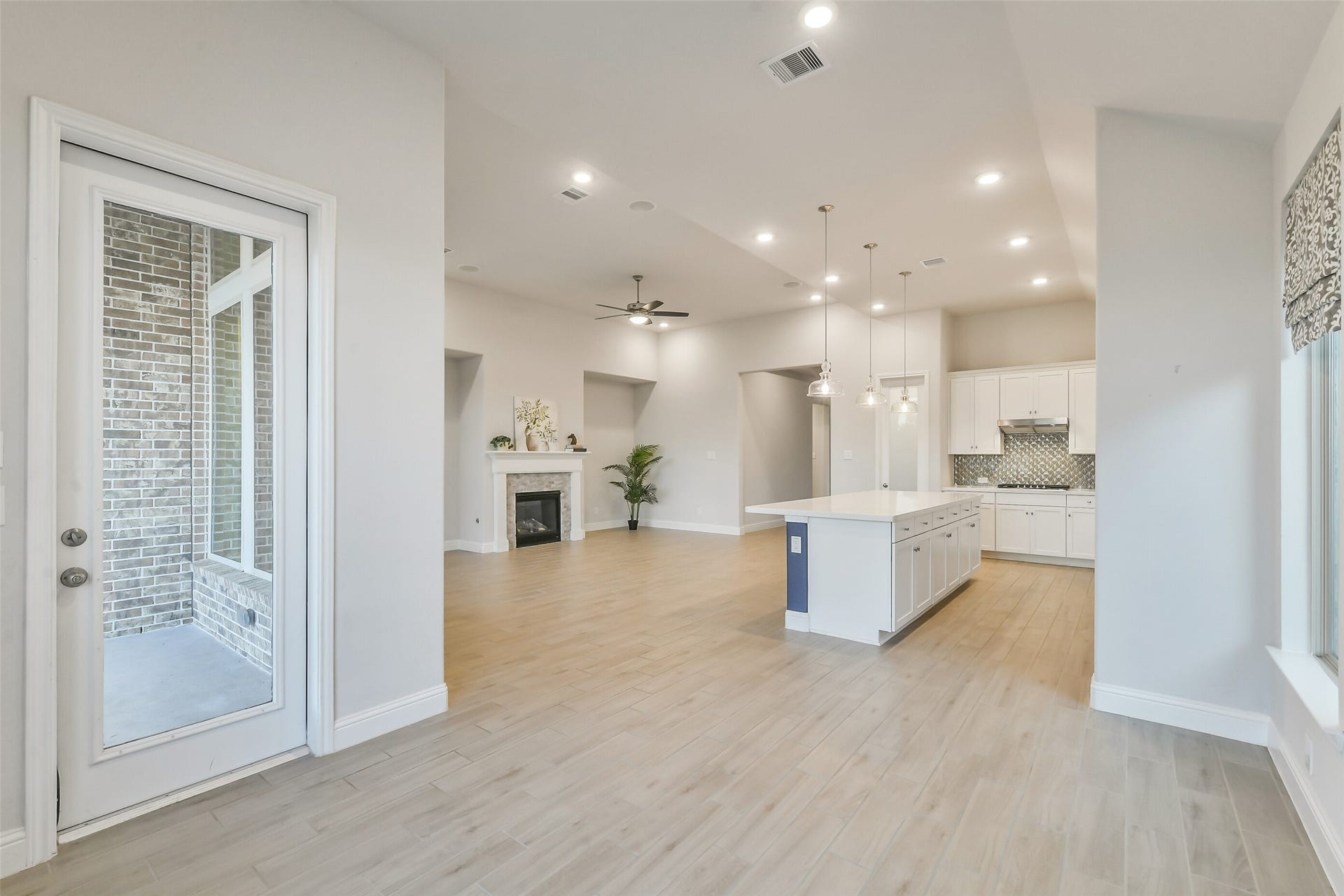 20330 Rose Gray Lane, Tomball, TX 77377 These spaces are defined but still all flow together.