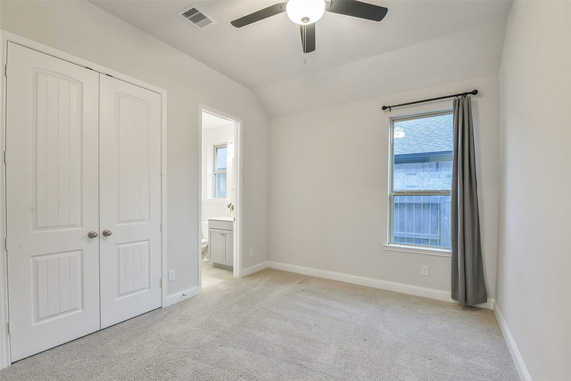 20330 Rose Gray Lane, Tomball, TX 77377 Secondary bedroom #1 with ensuite bath and ceiling fan