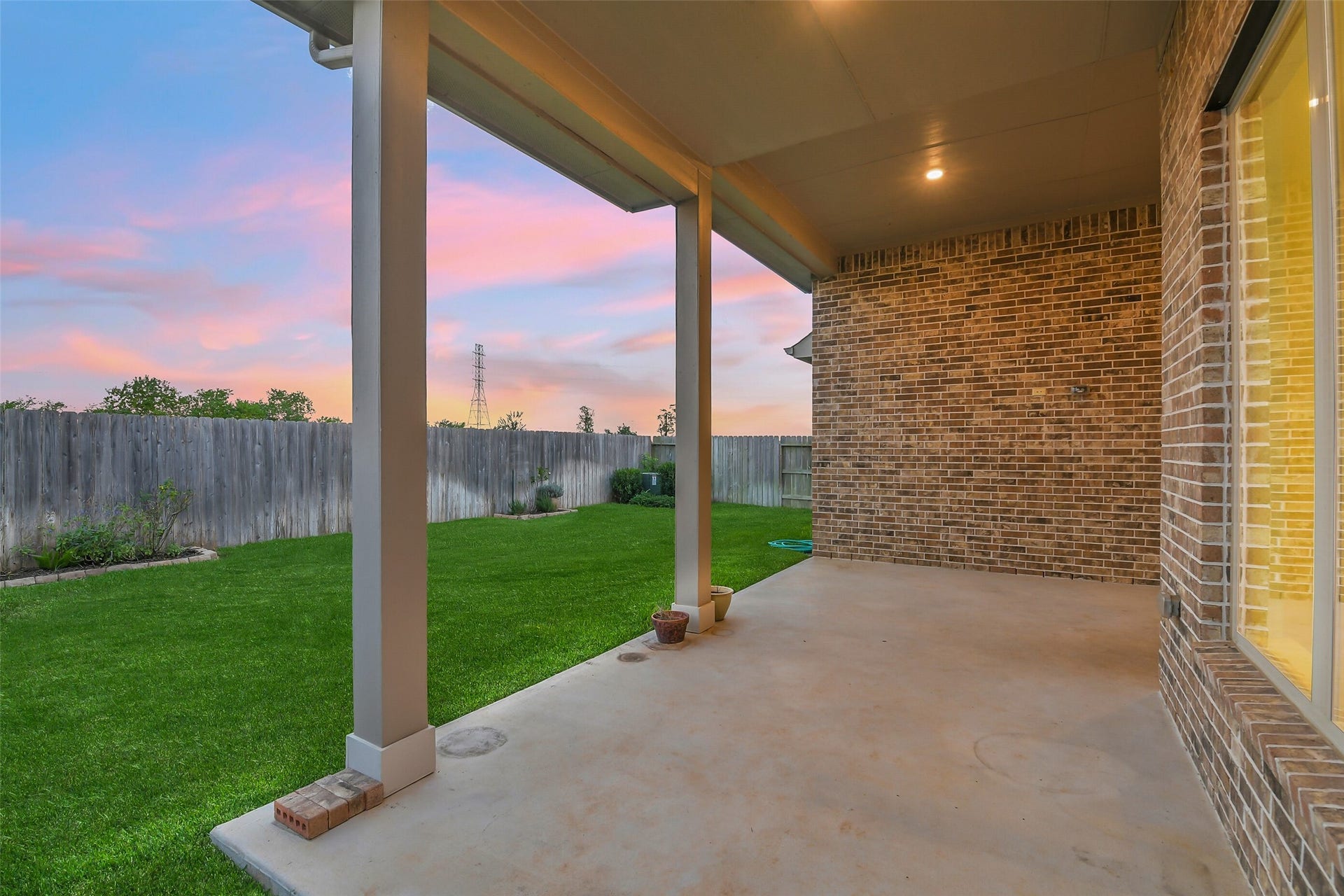 20330 Rose Gray Lane, Tomball, TX 77377 Large porch is perfect for hosting barbeques and gathering to spend time with friends and family.