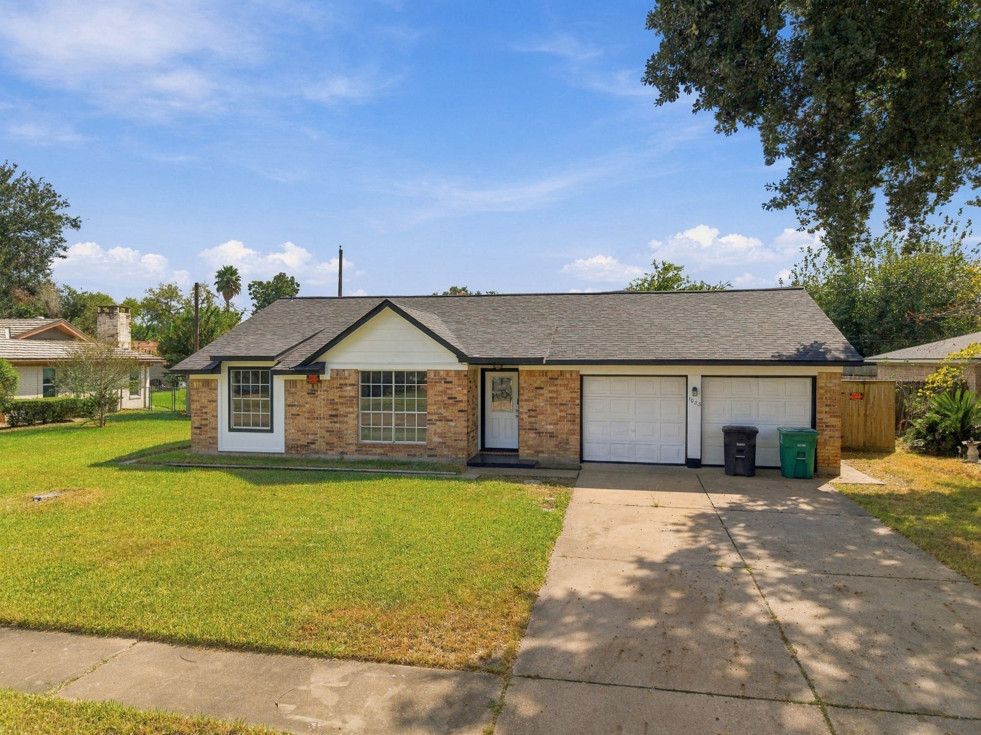 1023 Twinbrooke Drive, Houston, TX 77088 A classic one-story profile with mature surroundings, attached garage, and simple established curb appeal. Virtually staged.