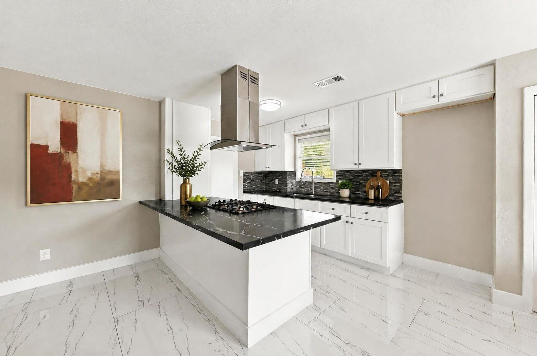 1023 Twinbrooke Drive, Houston, TX 77088 The kitchen feels clean and current with white cabinetry, quartz counters, gas cooking, and stainless details. Virtually staged.