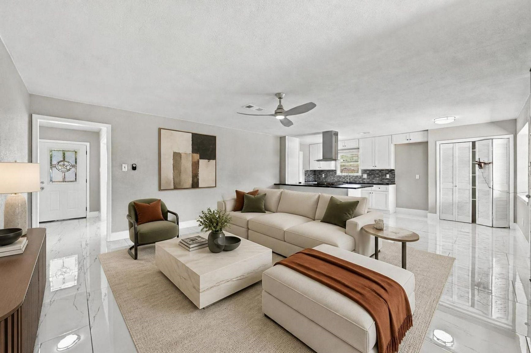 1023 Twinbrooke Drive, Houston, TX 77088 The living room feels polished and open with soft seating, natural light, and a clean modern palette. Virtually staged.