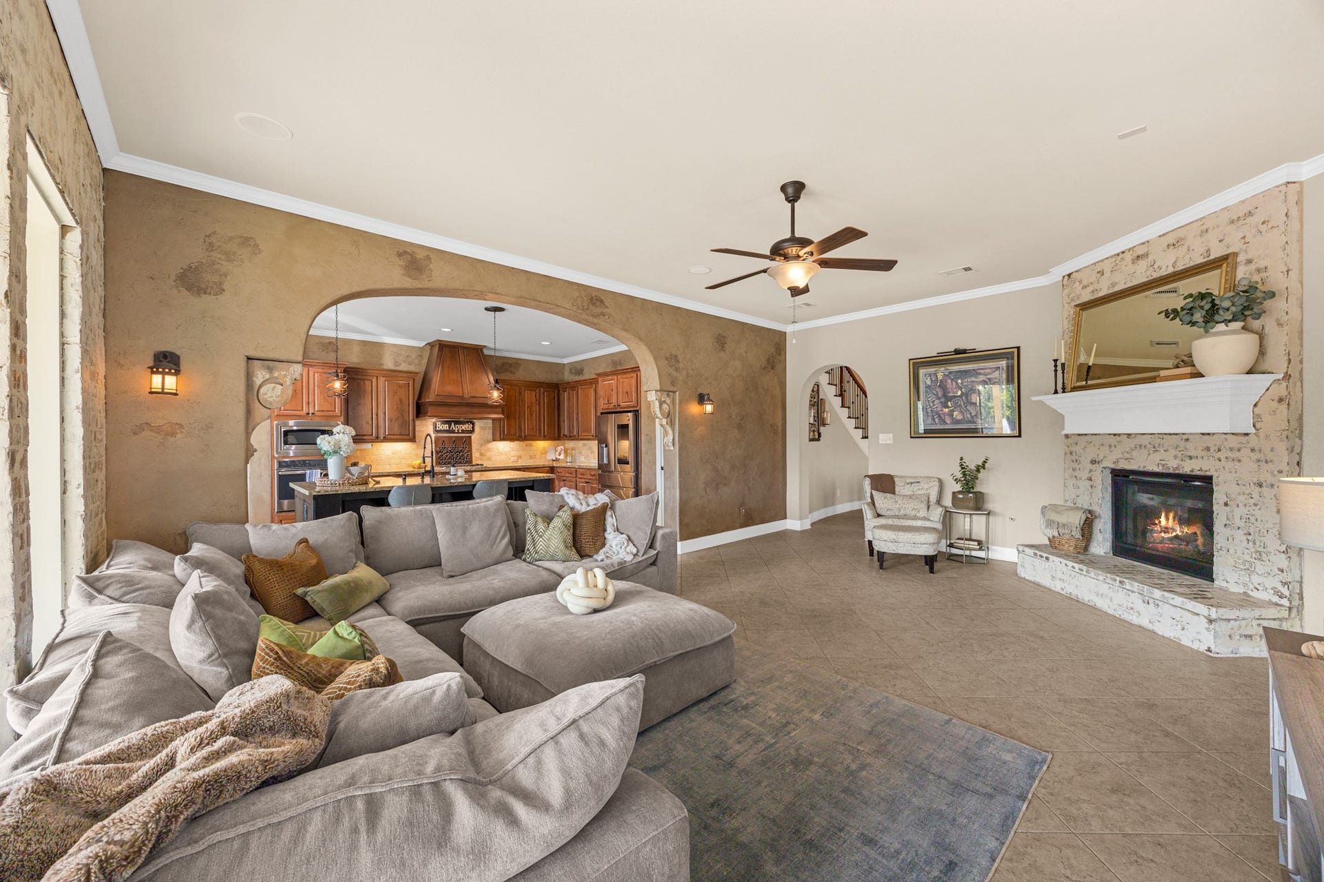 18515 Duke Lake Drive, Spring, TX 77388 Spacious family room designed for comfortable everyday living and entertaining, with an open layout connecting the kitchen and dining areas.