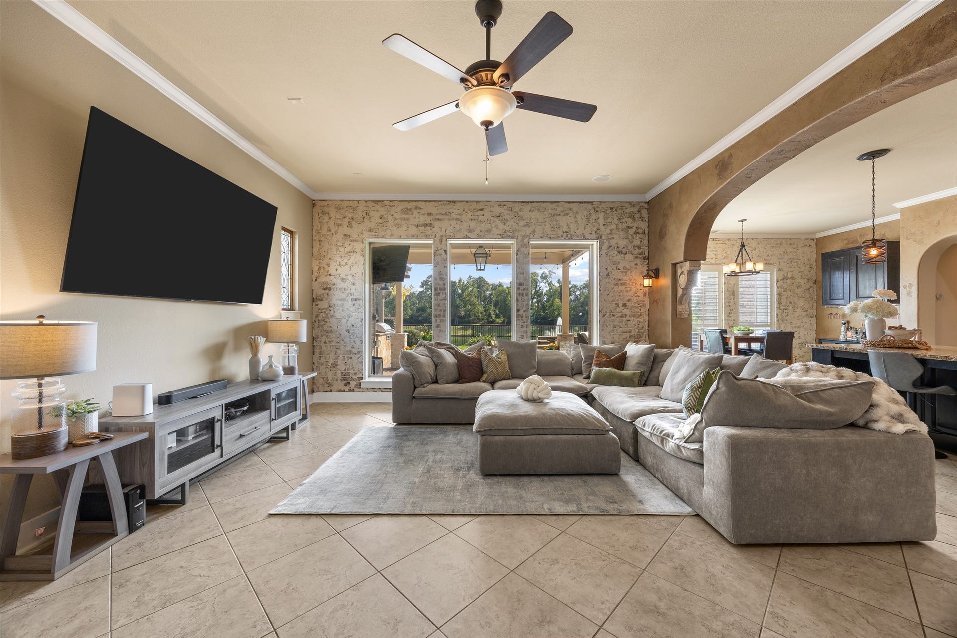 18515 Duke Lake Drive, Spring, TX 77388 Spacious family room designed for comfortable everyday living and entertaining, with an open layout connecting the kitchen and dining areas.