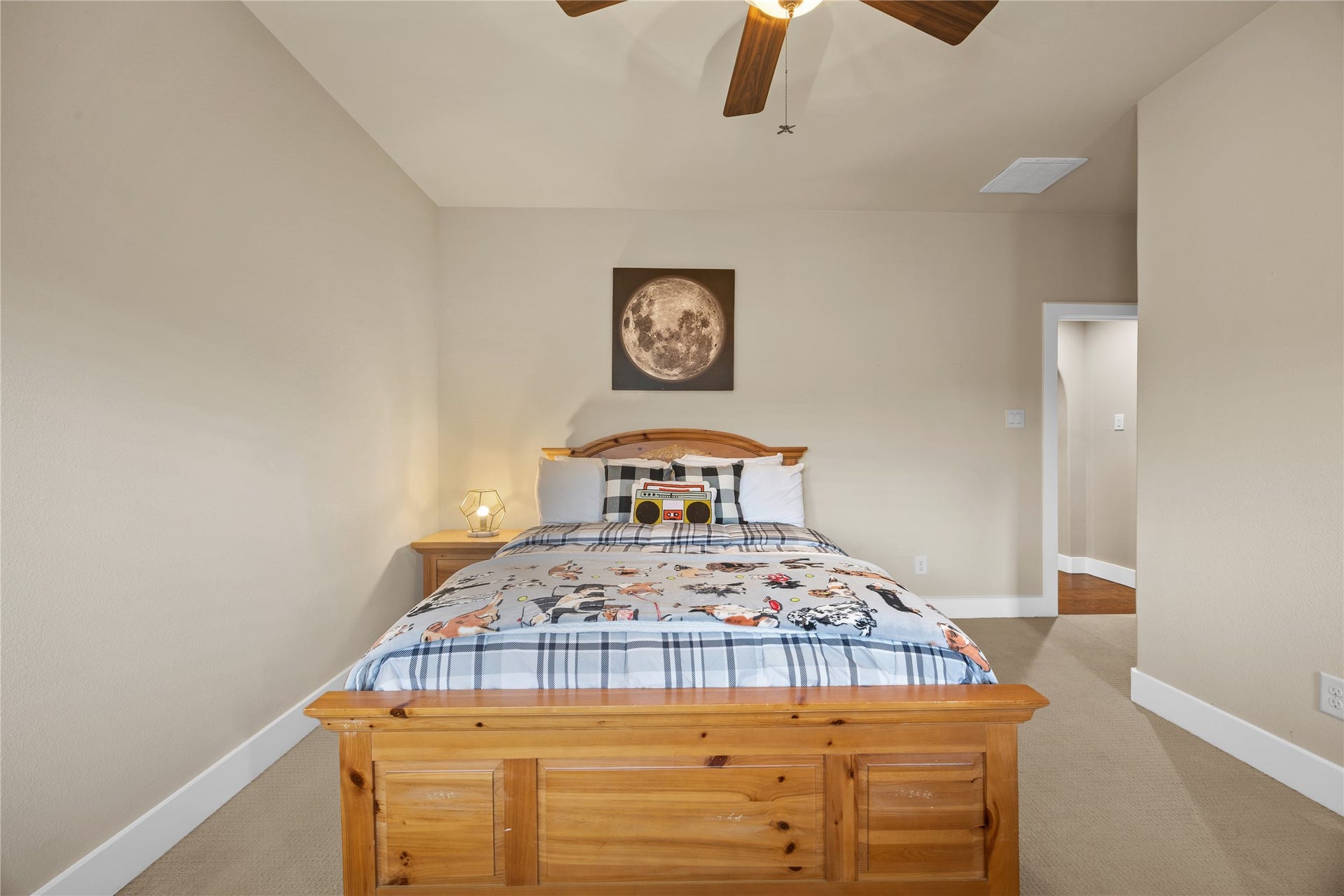 18515 Duke Lake Drive, Spring, TX 77388 Spacious upstairs bedroom featuring a vaulted ceiling, neutral finishes, ceiling fan, and comfortable layout.
